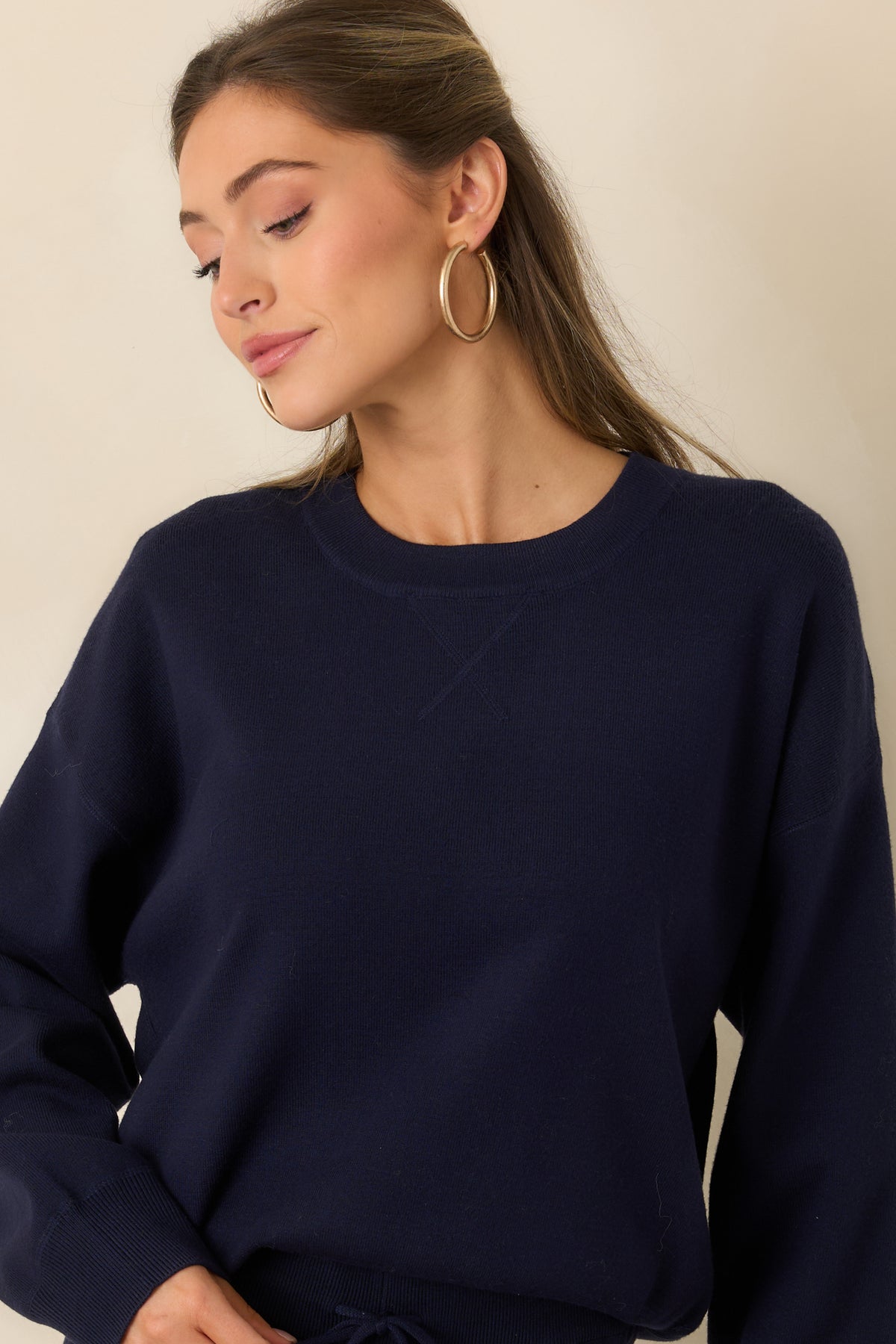Roomy long sleeves and dropped shoulders create the relaxed shape of this sweater-knit top.