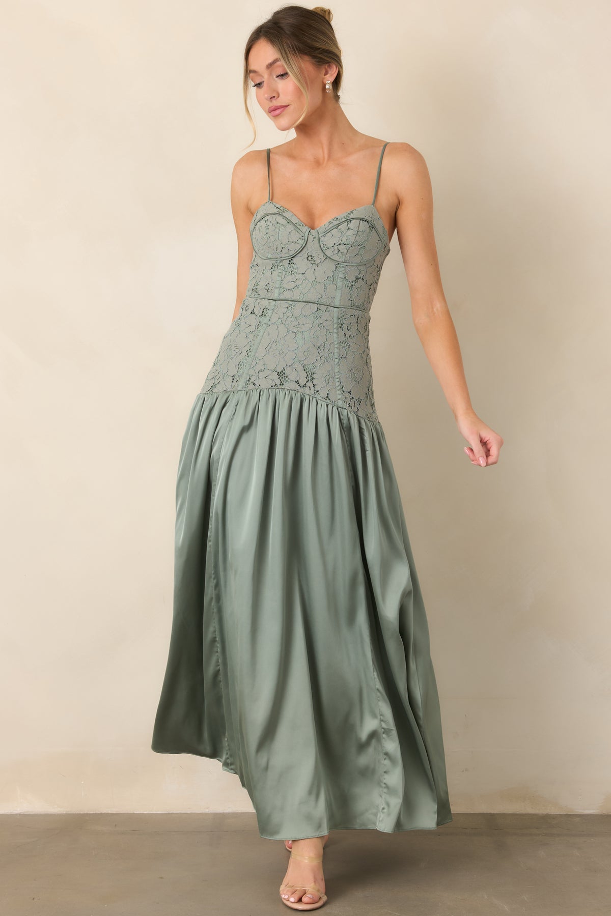 Sweetheart dress featuring a fitted bodice and flowing gathered maxi skirt.