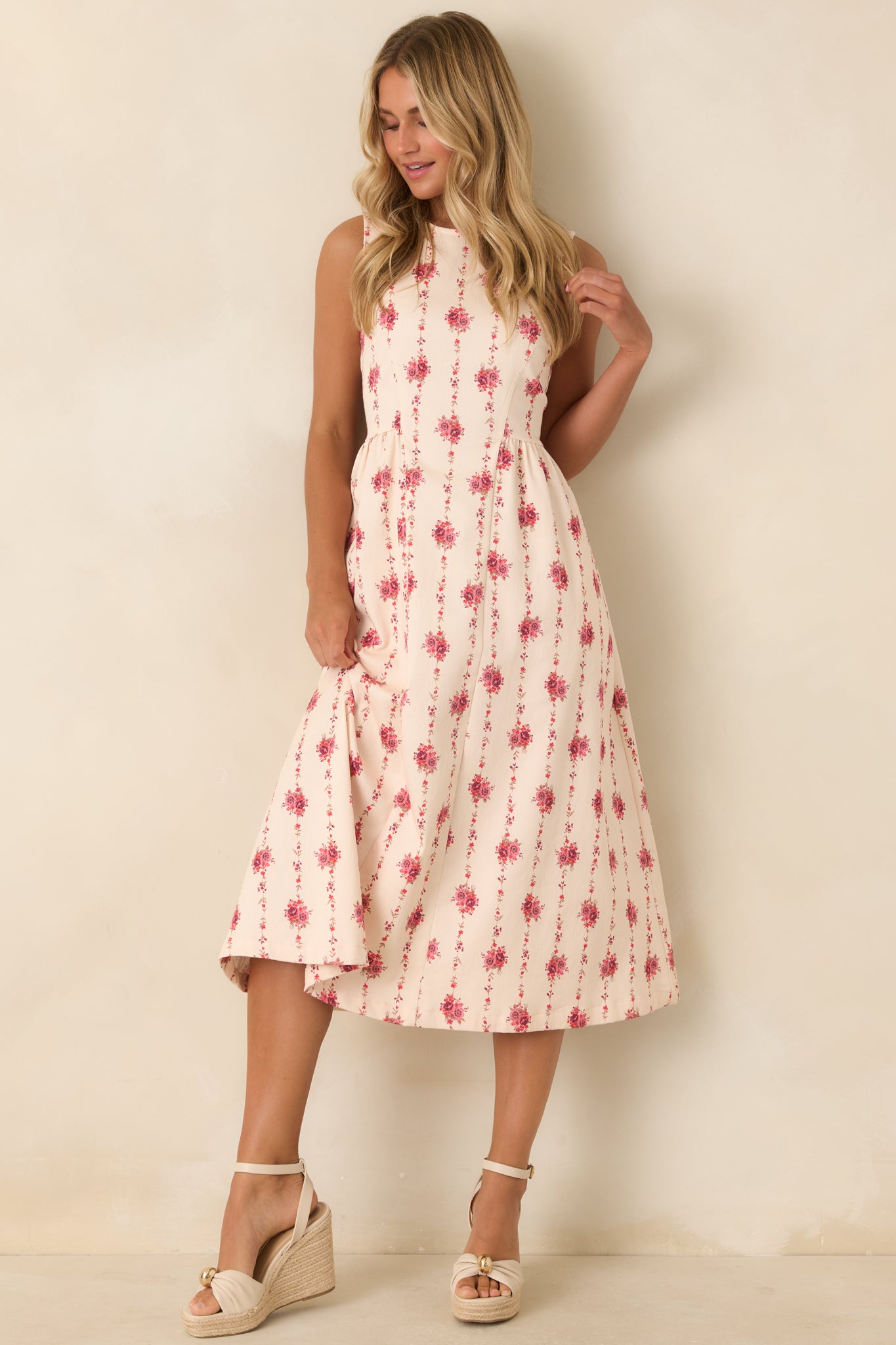 Tailored floral stripe midi dress with a princess-seam bodice, flattering flared skirt, and comfortable stretch cotton construction.