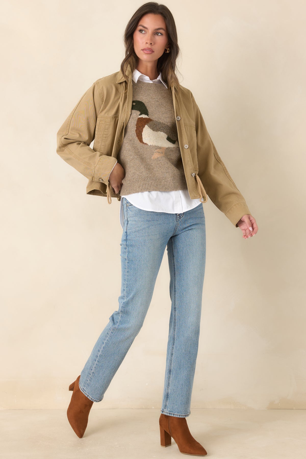 Taupe knit sweater showcases an earthy mallard design in brown, olive green, ivory, and muted gold.