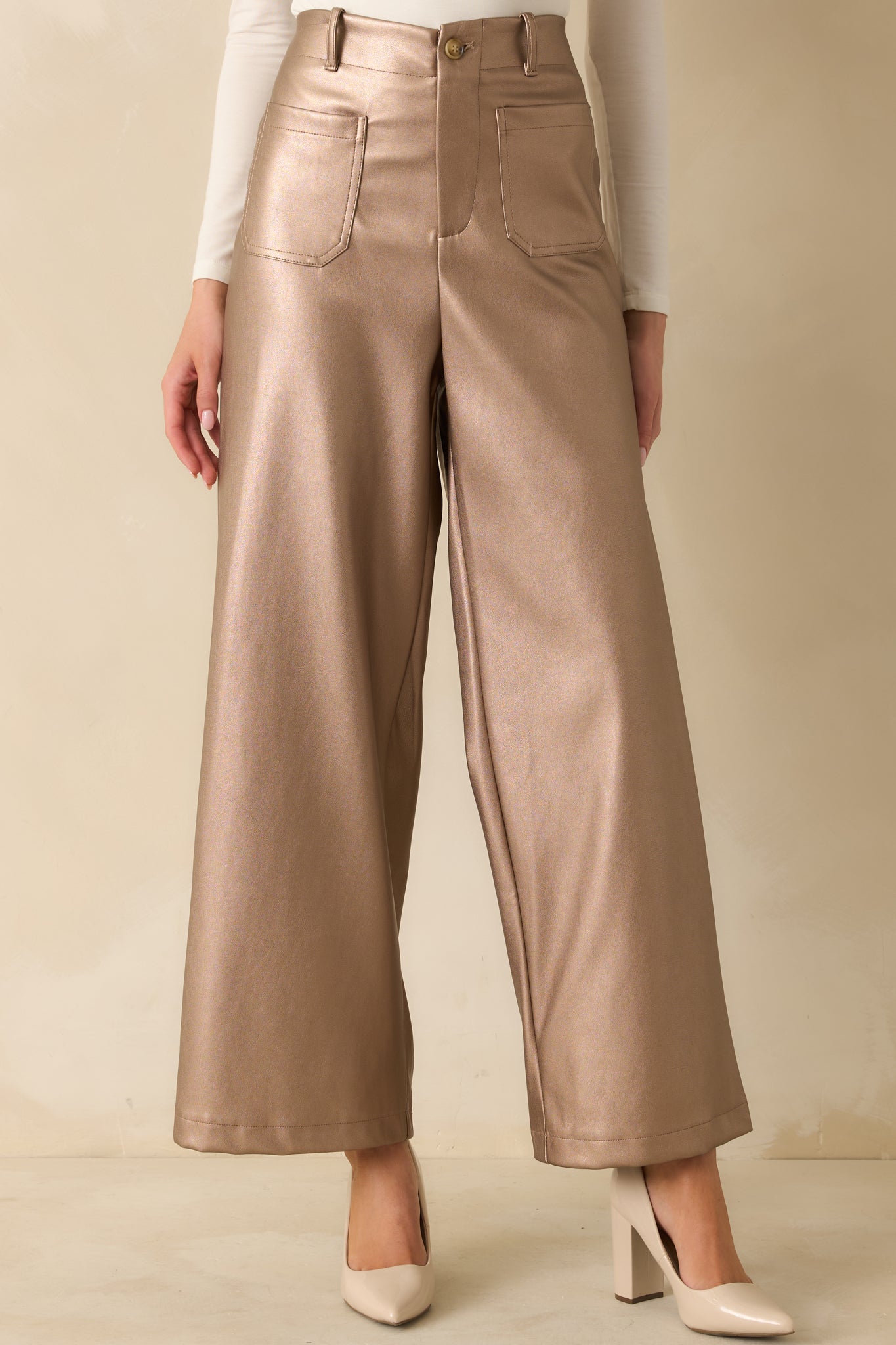 Smooth taupe metallic fabric showing subtle shine and texture through the wide leg design.