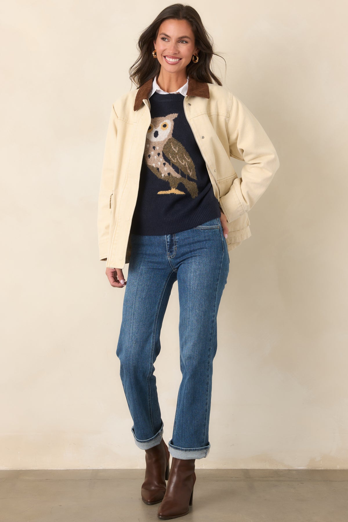 Taupe utility jacket featuring a brown corduroy collar, long sleeves, button cuffs, and functional flap pockets at the hips.