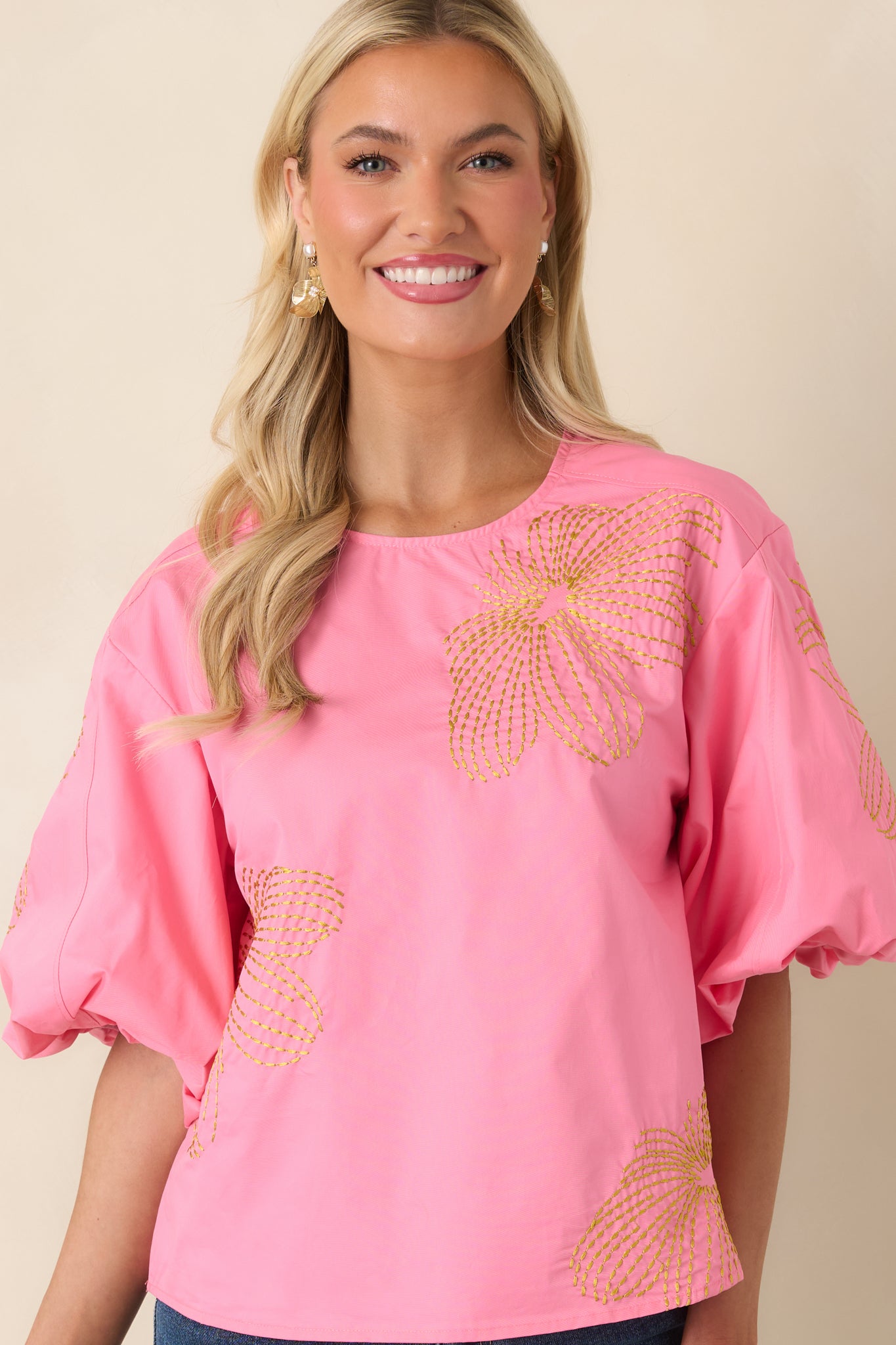 Textured chartreuse embroidery adds contrast to this lightweight cotton top design.