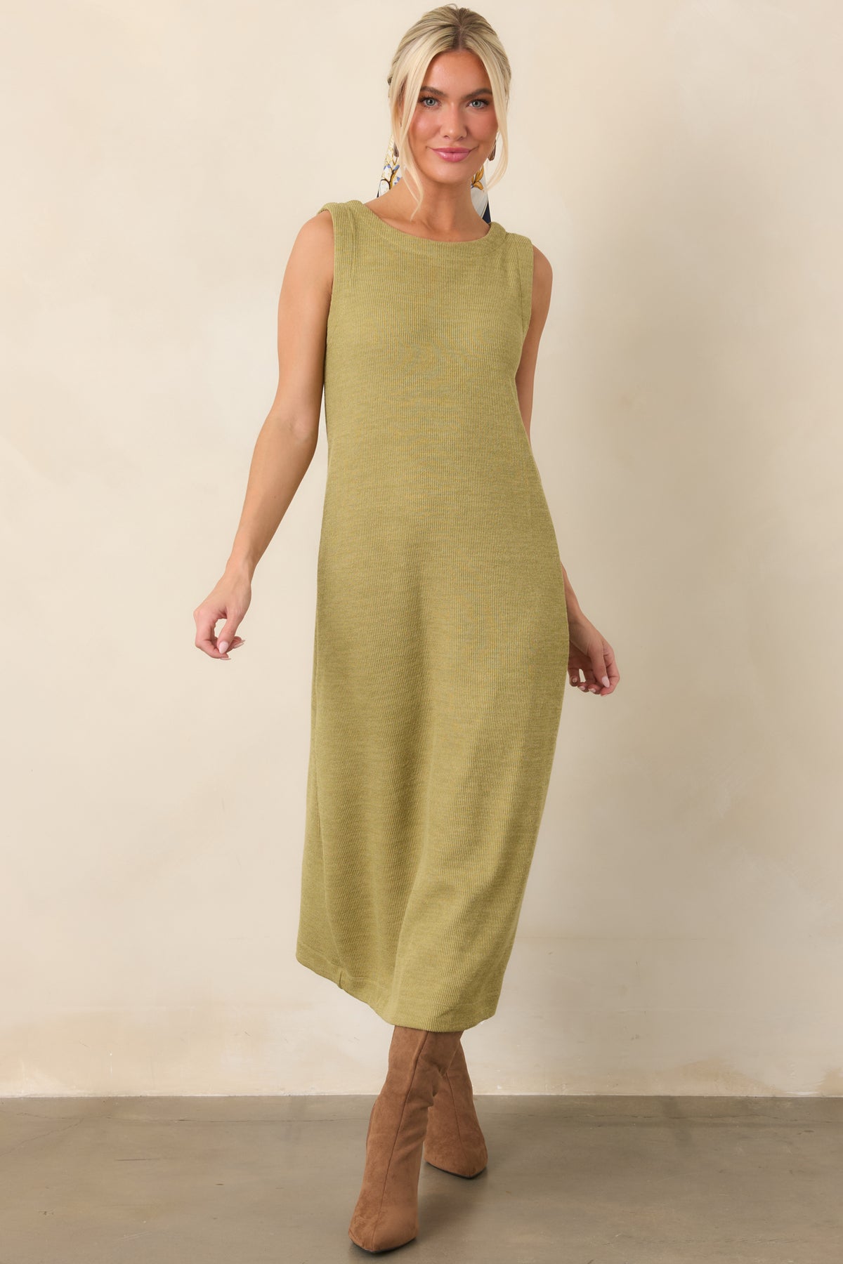 Textured olive midi dress with a clean sleeveless silhouette, rounded neckline, and easy column-inspired shape.