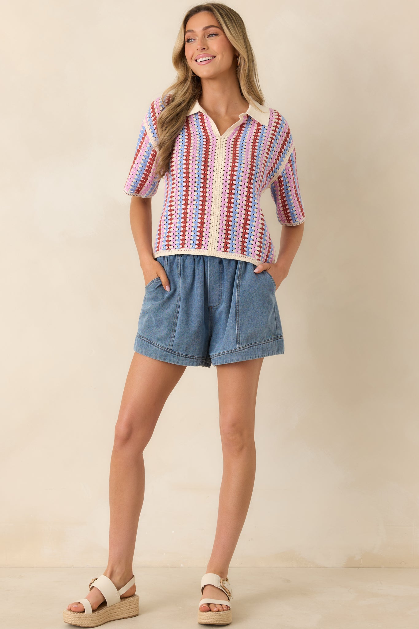 Textured striped top with violet, rust, and sky blue tones and relaxed silhouette.