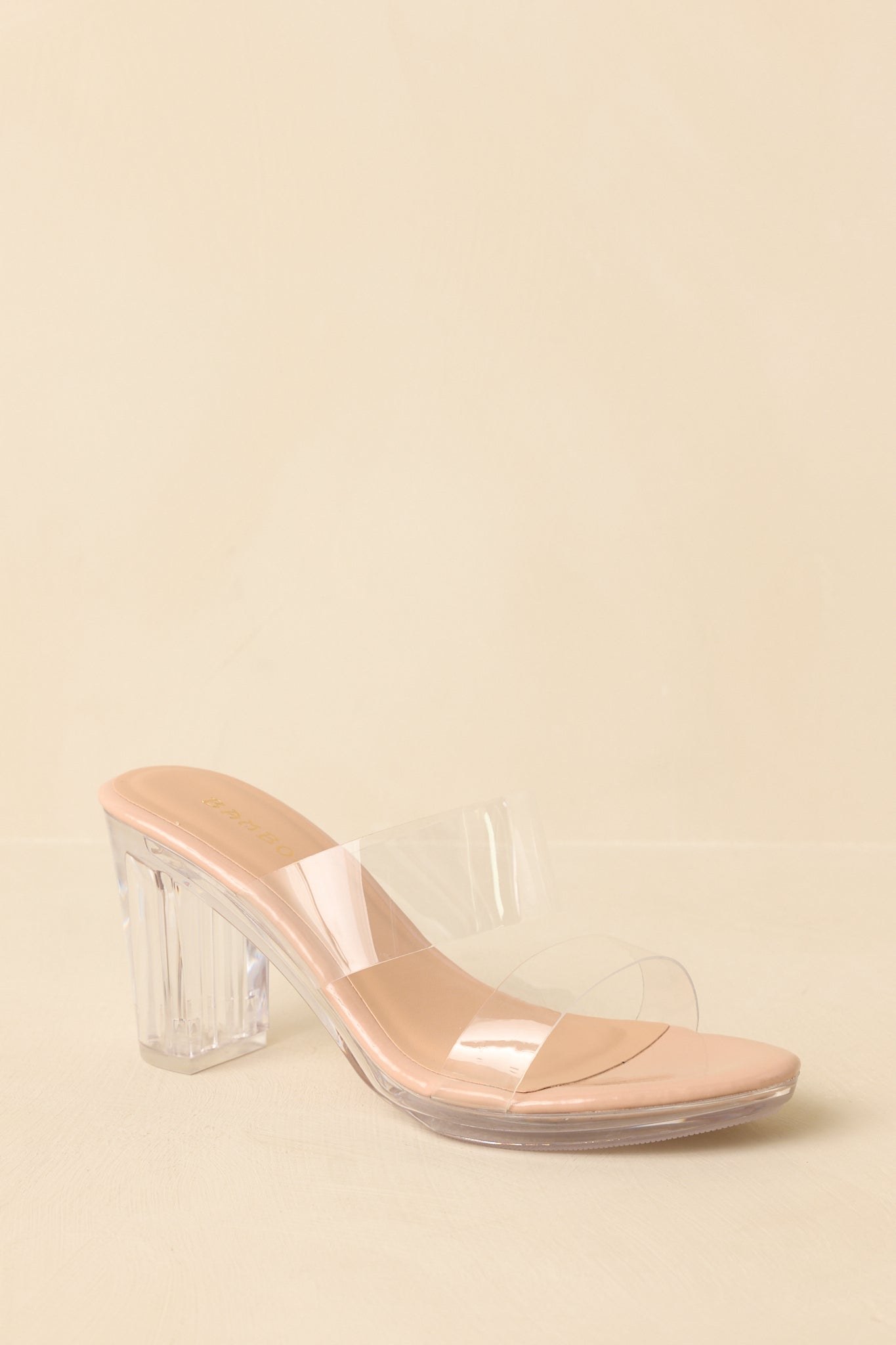 Three-quarter angle view showing the slip-on construction and clean, contemporary silhouette.