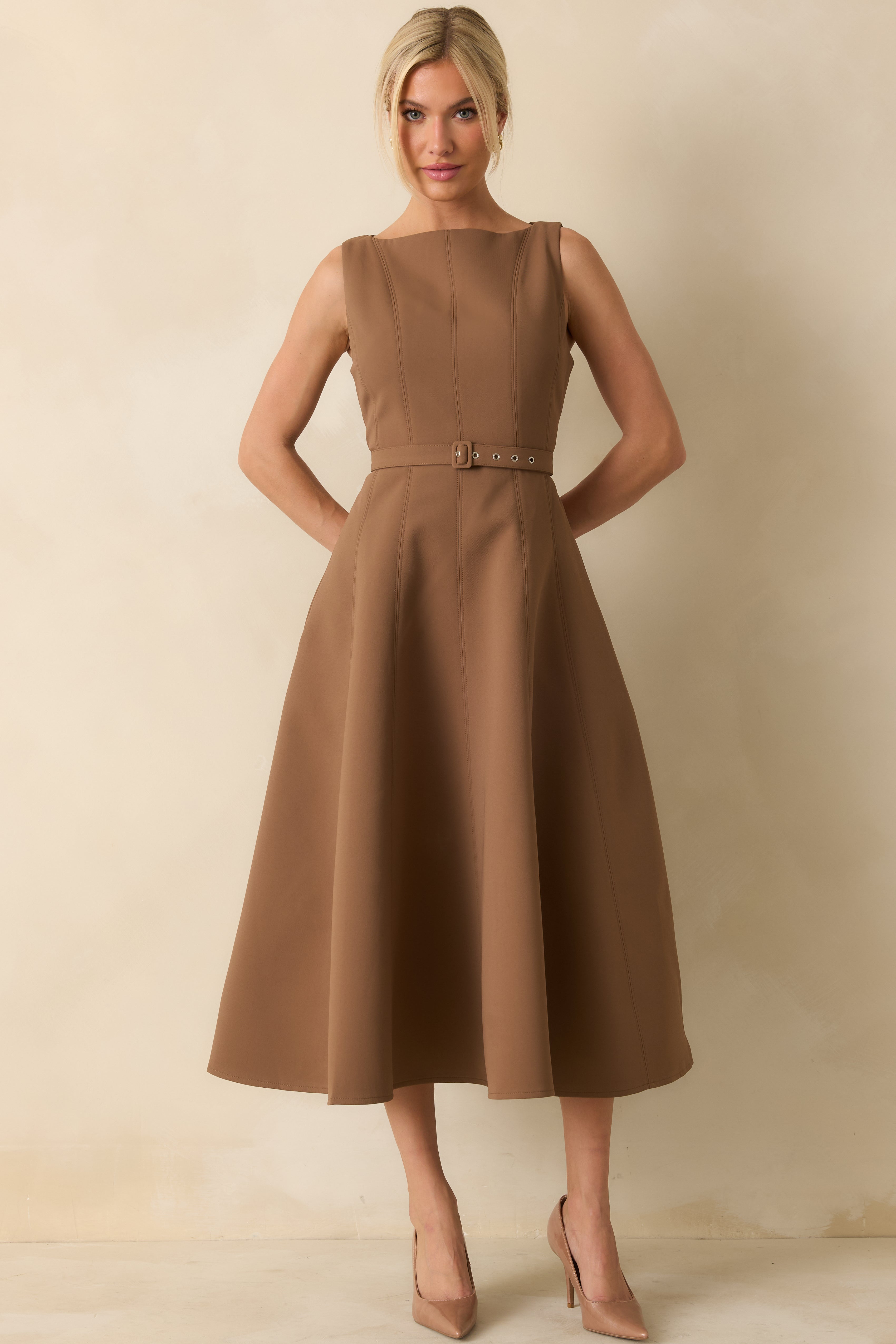 Toffee brown dress with a cinched waist and elegant midi-length design.
