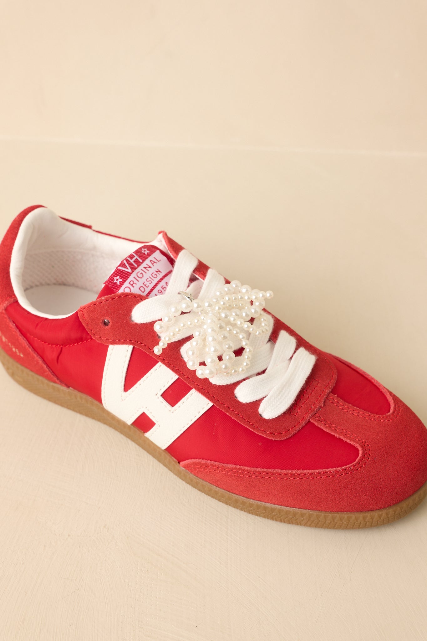 Top-down view emphasizing lace configuration and textured paneling.