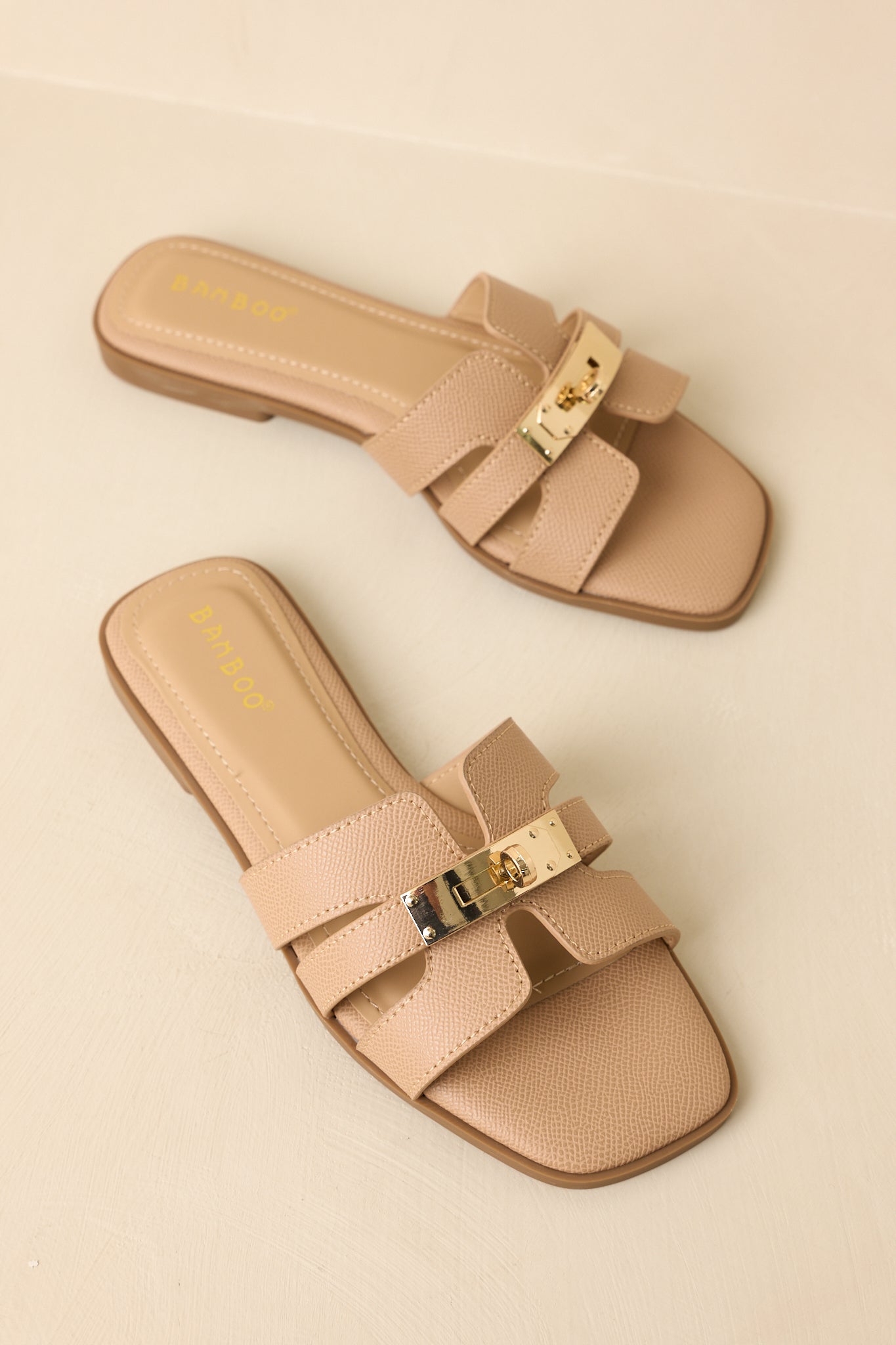 Top-down view emphasizing strap placement and smooth footbed design.