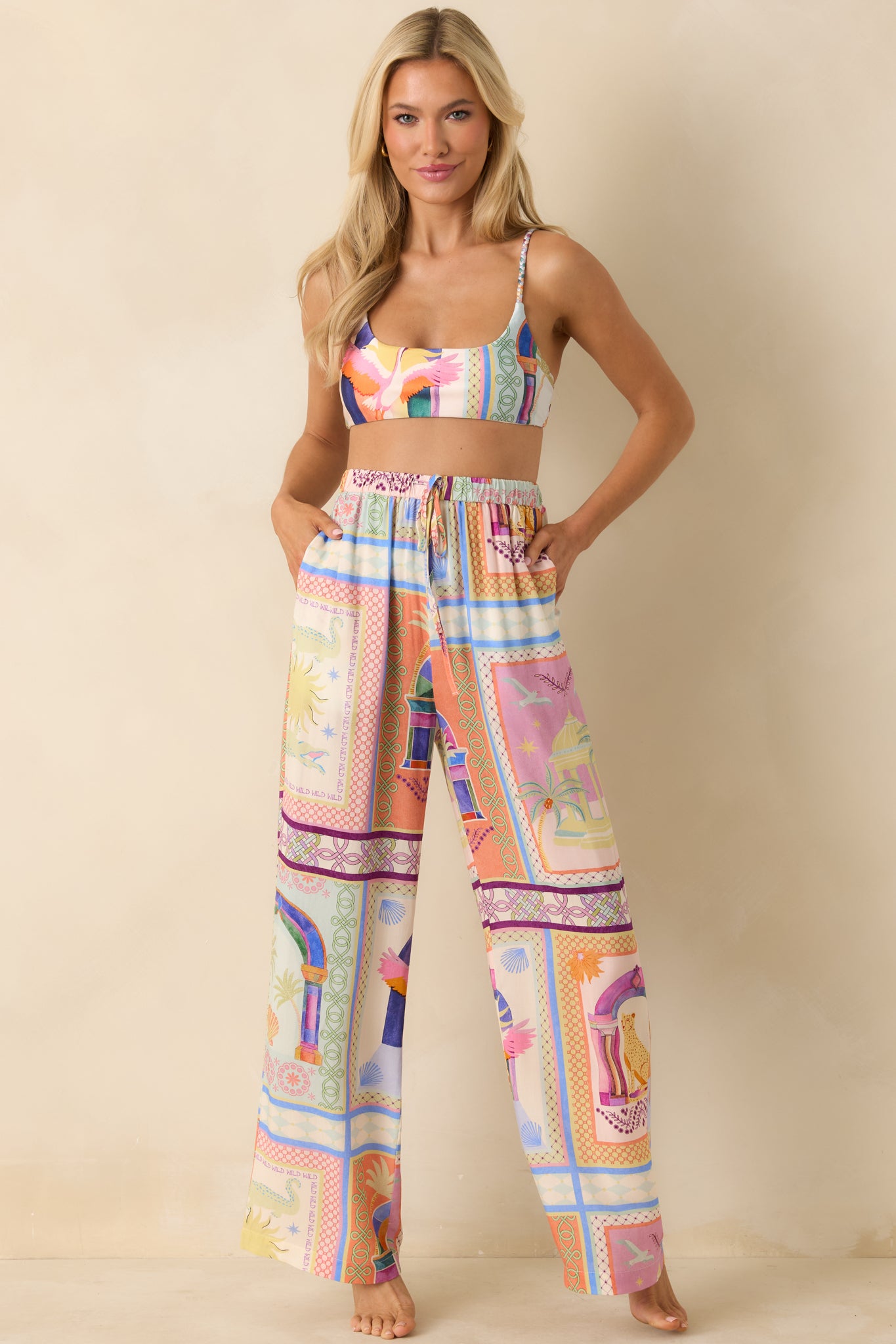 Vibrant tropical print bikini top with secure back clasp and comfortable fit.