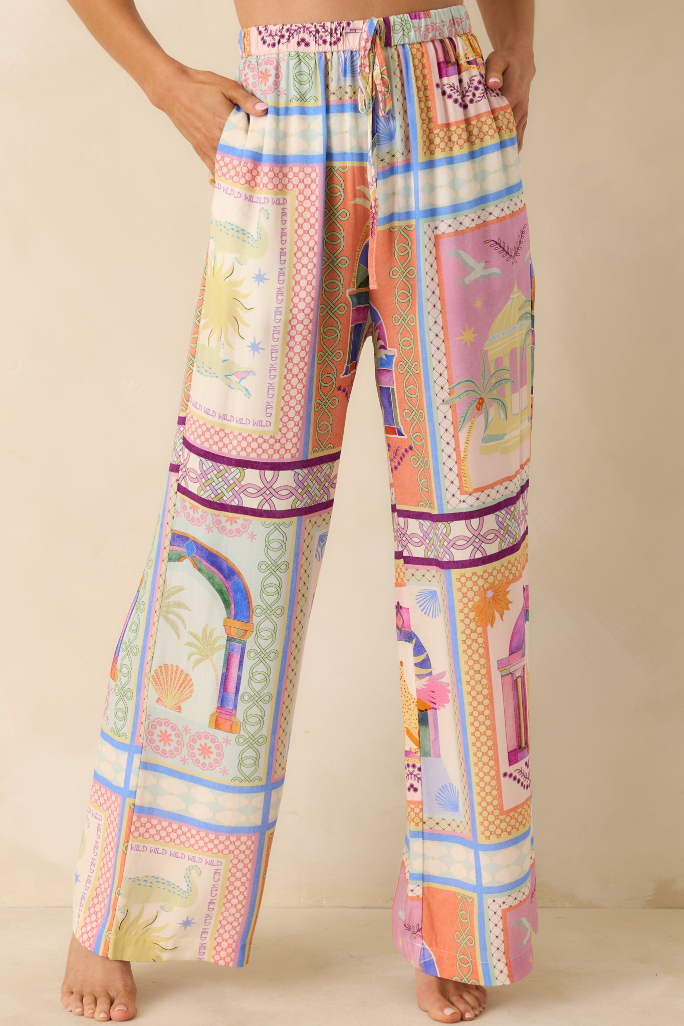 Tropical woven pants displaying the adjustable drawstring tie and multicolor pattern.