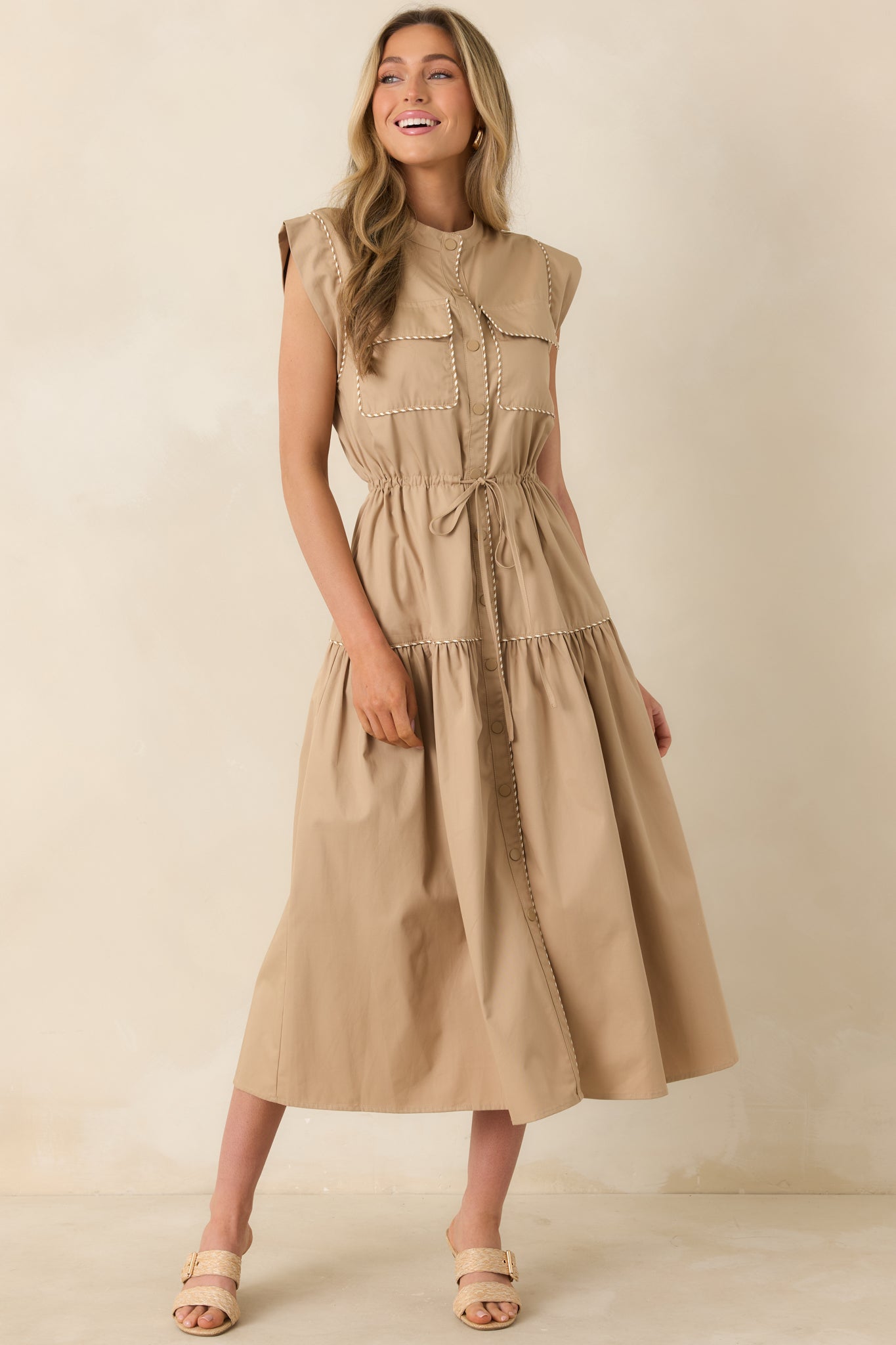 Utility-inspired midi dress with cap sleeves, stand collar, and functional side pockets