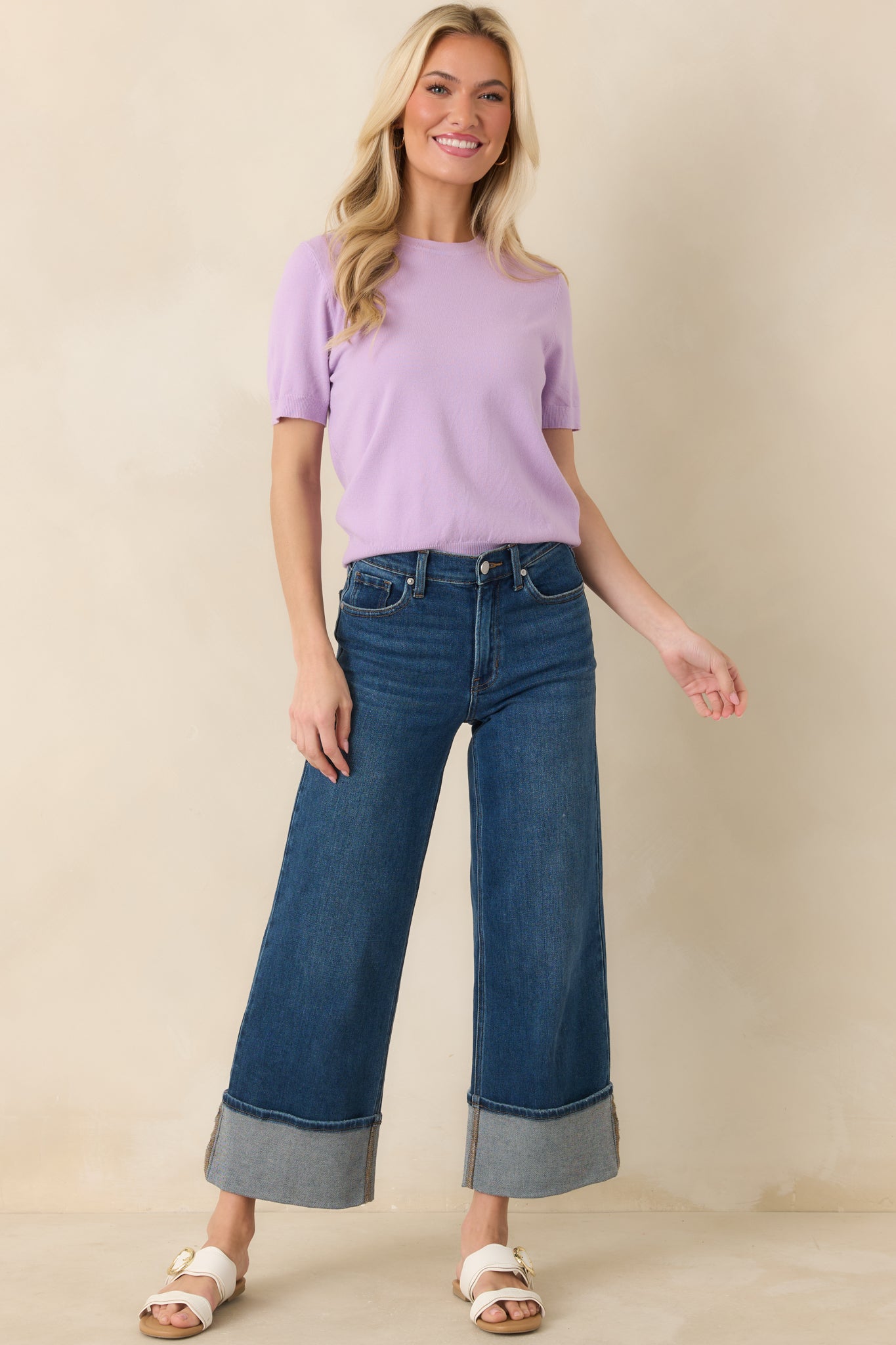 Front-facing view of a versatile knit top in soft lavender, featuring a fitted but comfortable silhouette.