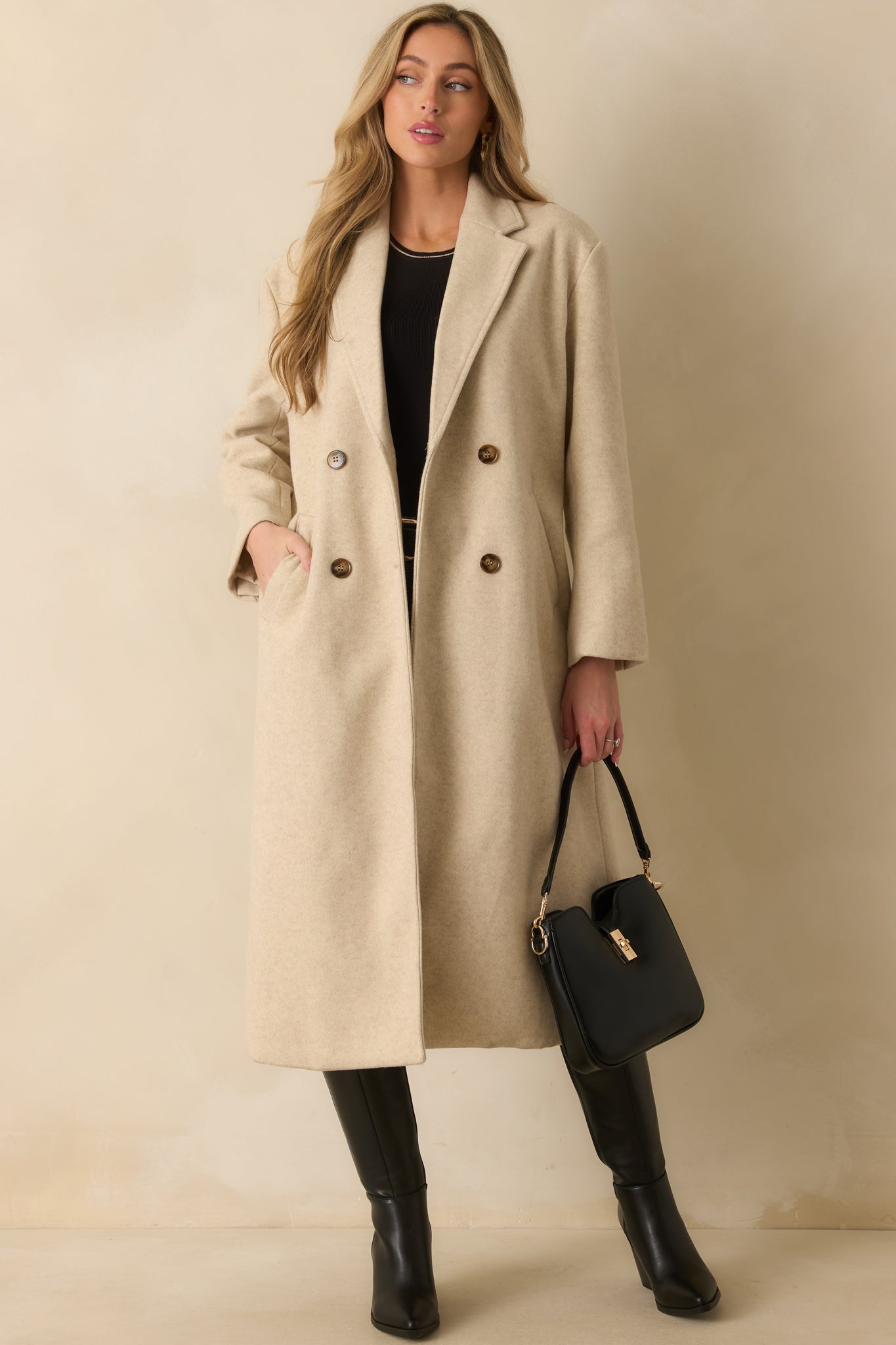 View of the pocket and front seam construction emphasizing the coat’s structured finish.