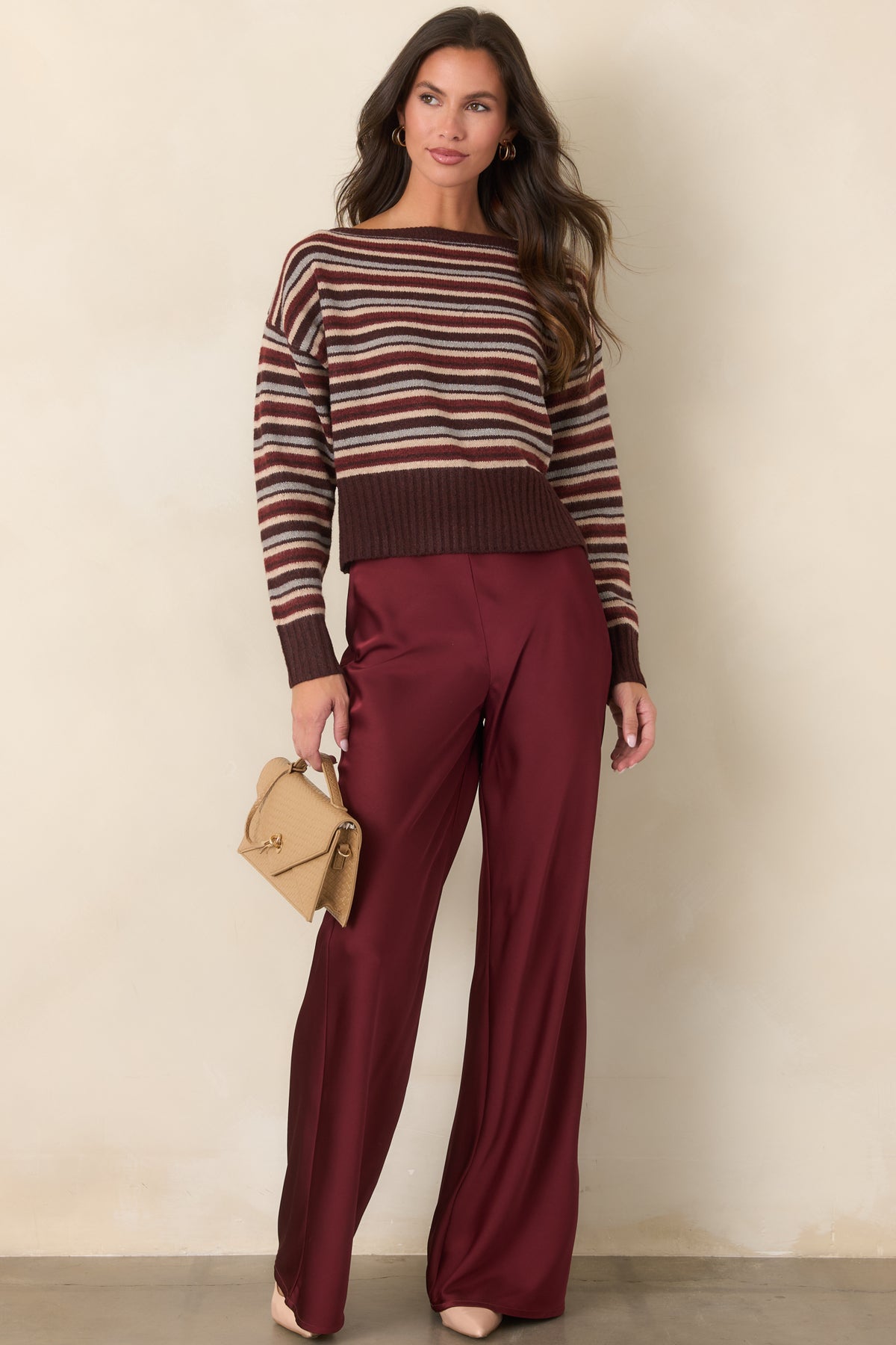 Vintage-inspired striped top featuring a slightly cropped hem with a broad ribbed band.