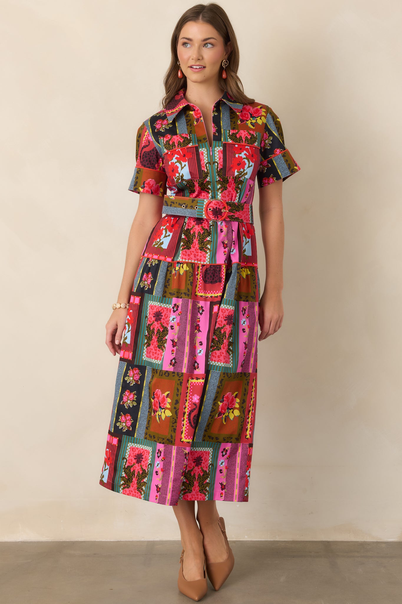 Ankle-length Vintage Vignette dress featuring a fitted waist, covered-buckle belt, contrast-trimmed cuffs, collared neckline, and dramatic mix of decorative prints.