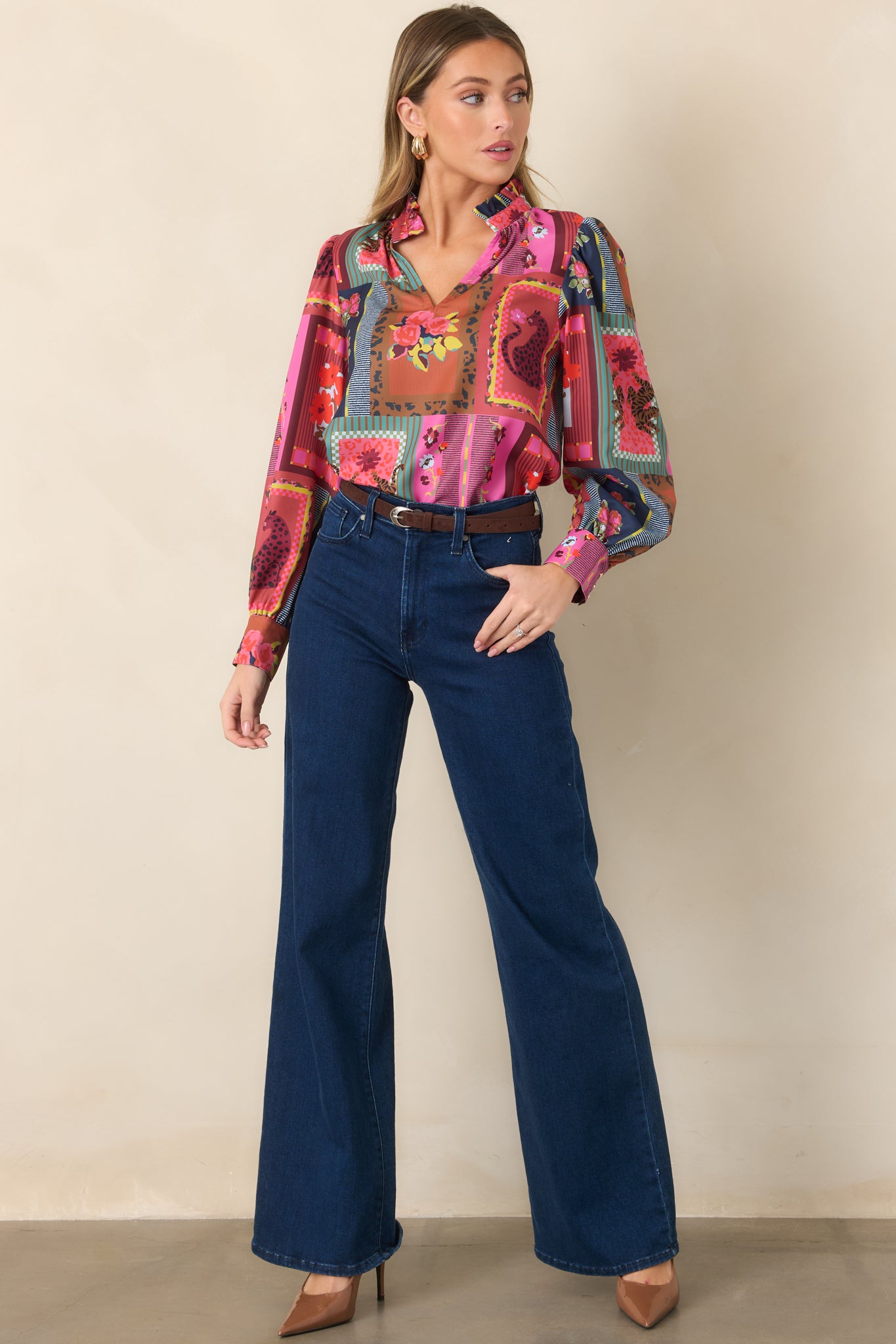 Lightweight Vintage Vignette print top featuring a ruffled split neckline, softly gathered shoulders, long blouson sleeves, and buttoned cuffs.