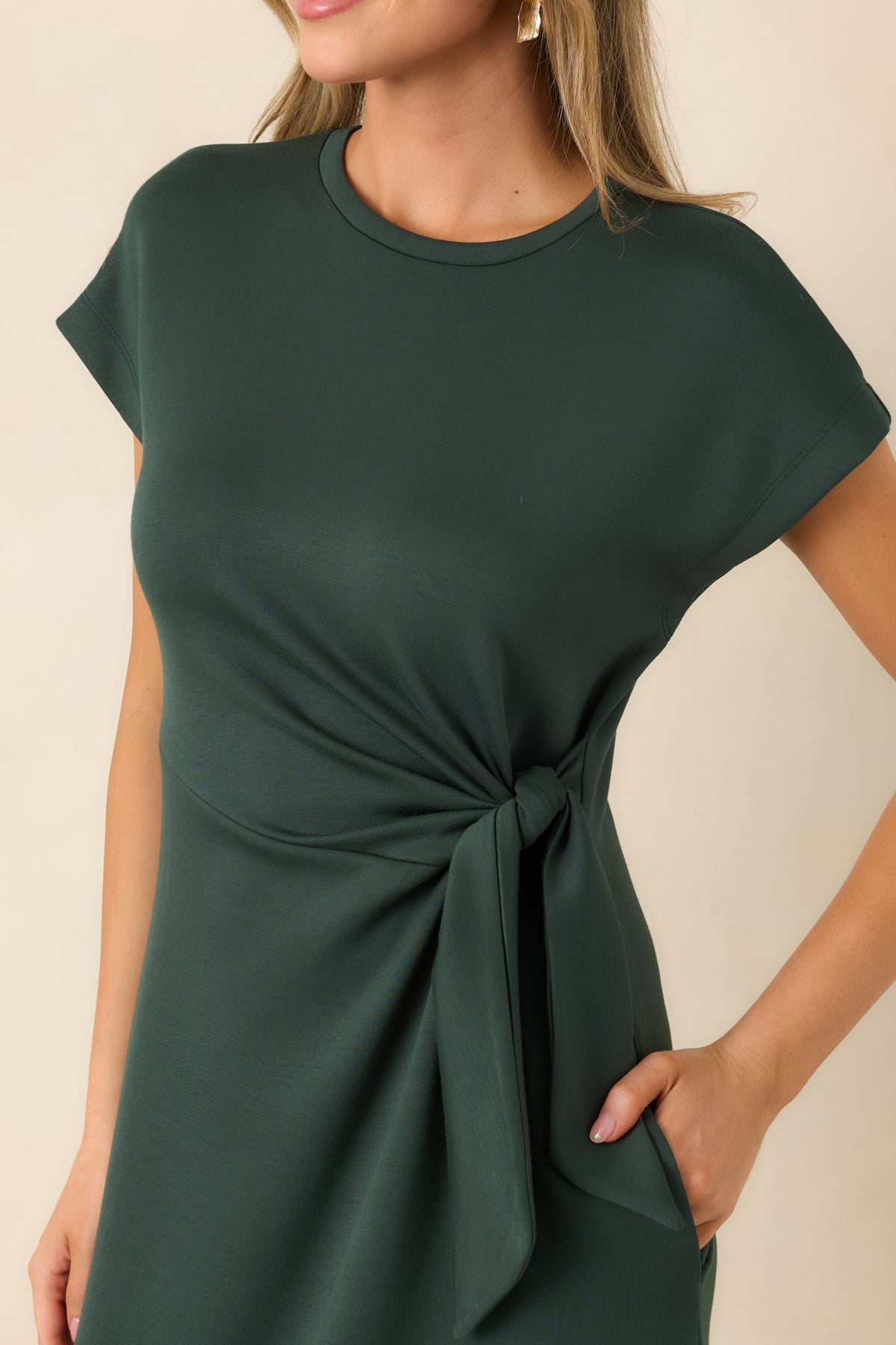 Waist knot creates soft gathers and dimensional draping across the smooth stretch fabric of the midi dress.