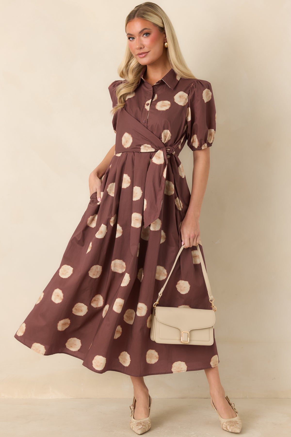 Warm earthy midi dress featuring a softly blurred dot print and full A-line skirt.