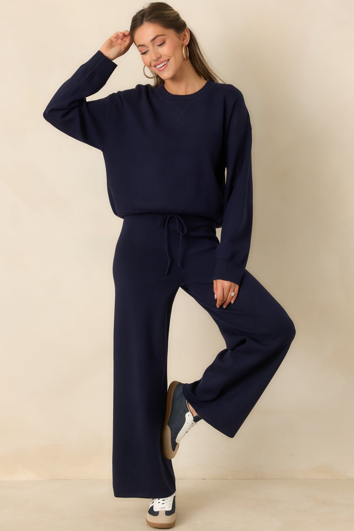 Comfortable crewneck top with a lived-in wash, relaxed fit, and ribbed sleeve cuffs.