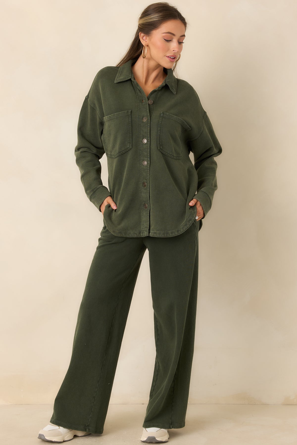Casual olive green cotton-blend pants with a relaxed fit and subtly washed finish.
