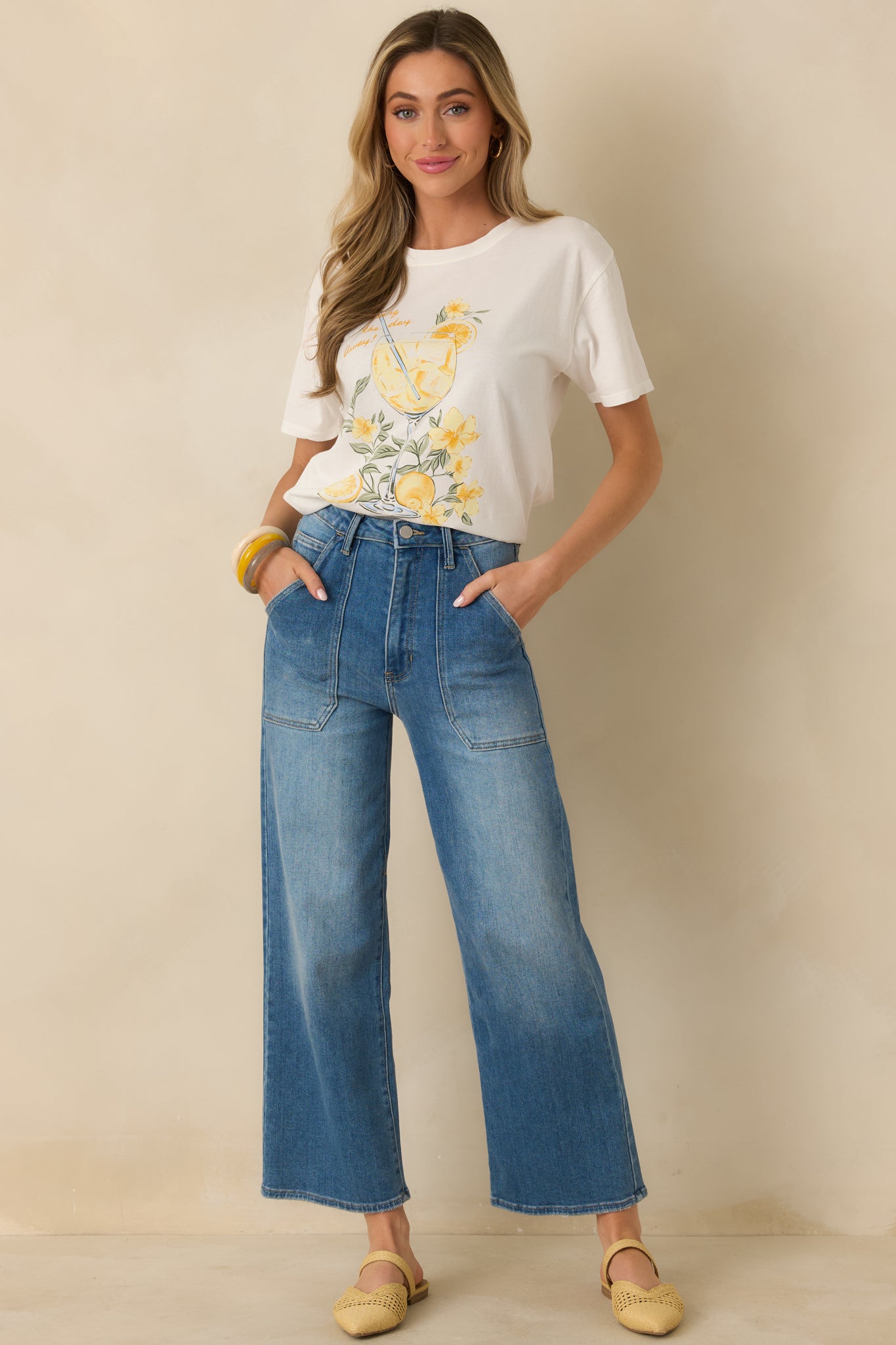 White cotton jersey tee with a spritz cocktail and citrus graphic on the front, crew neckline, and relaxed boyfriend fit.