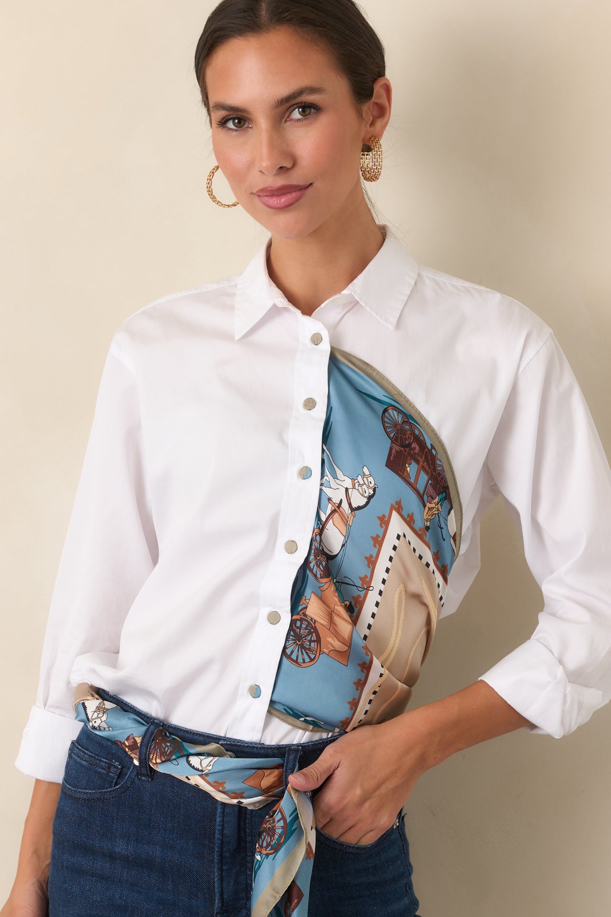 White button-up shirt showcasing the structured cotton poplin fabric and classic collar.