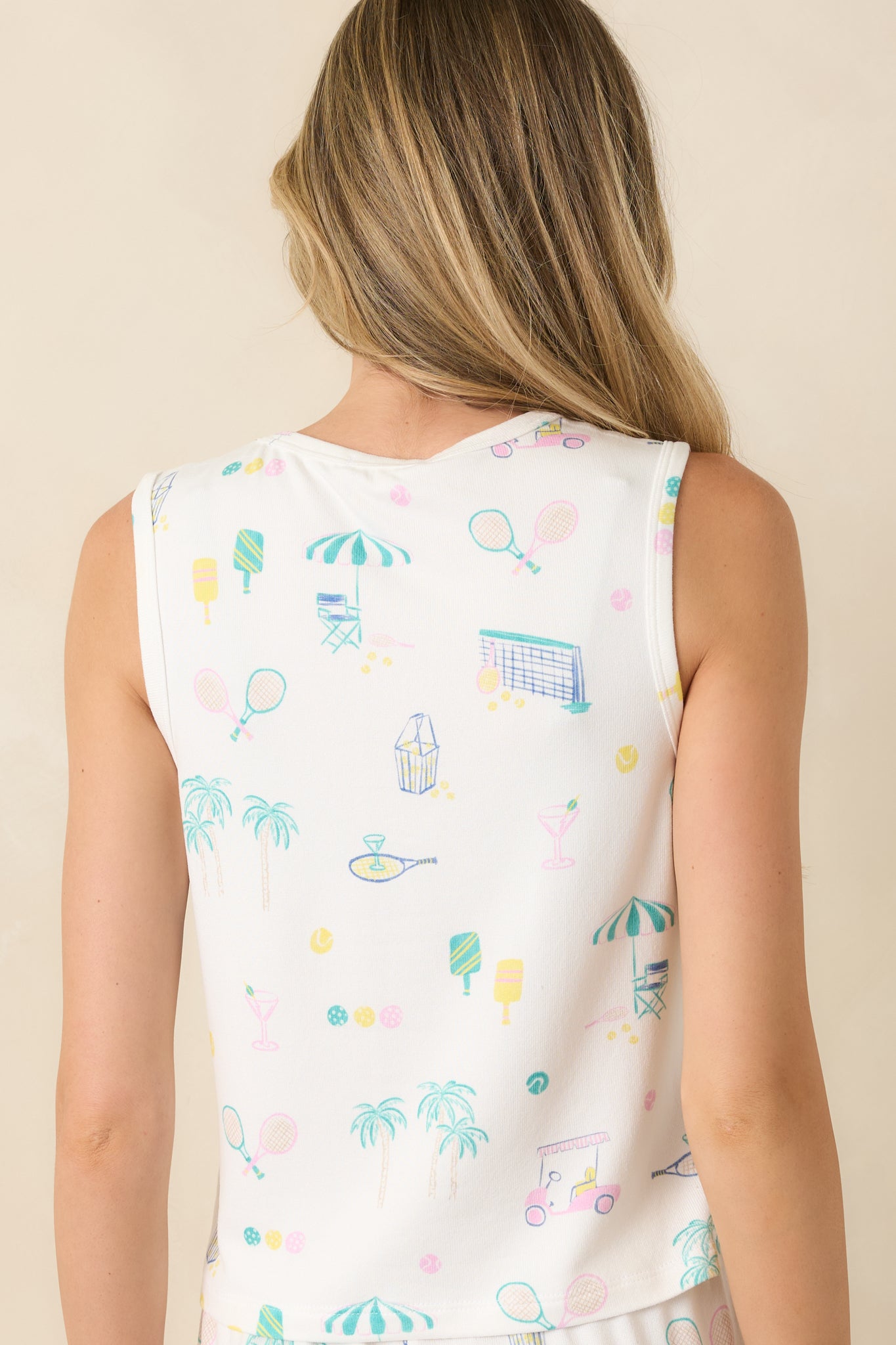 Back view of the white multi print pajama tank featuring a relaxed fit, sleeveless design, and continuous resort-inspired print.