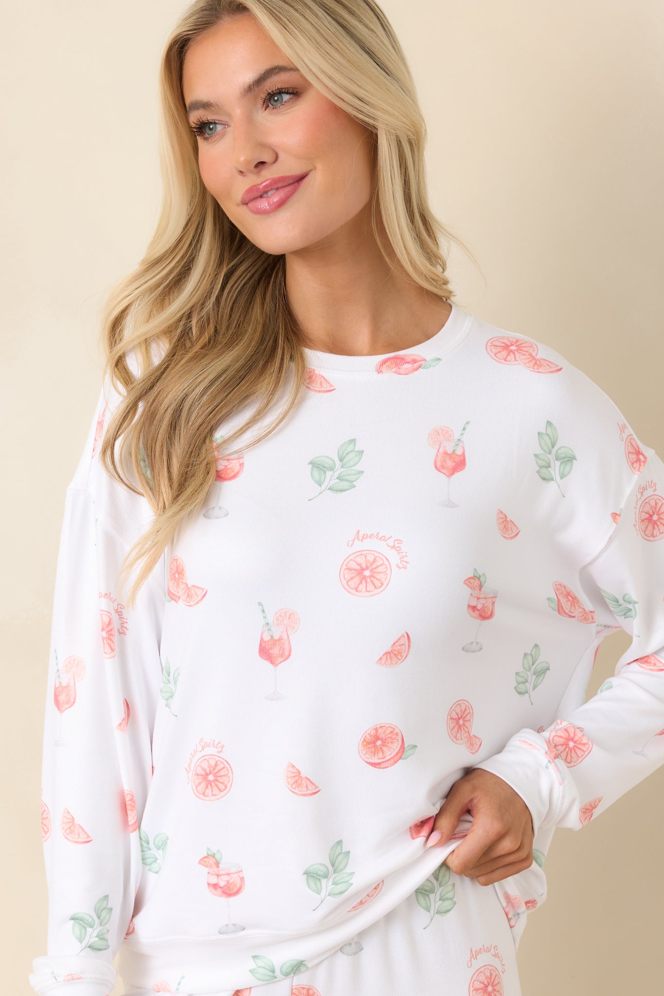 White sleep top featuring cocktail and citrus print, with a smooth, easy drape.