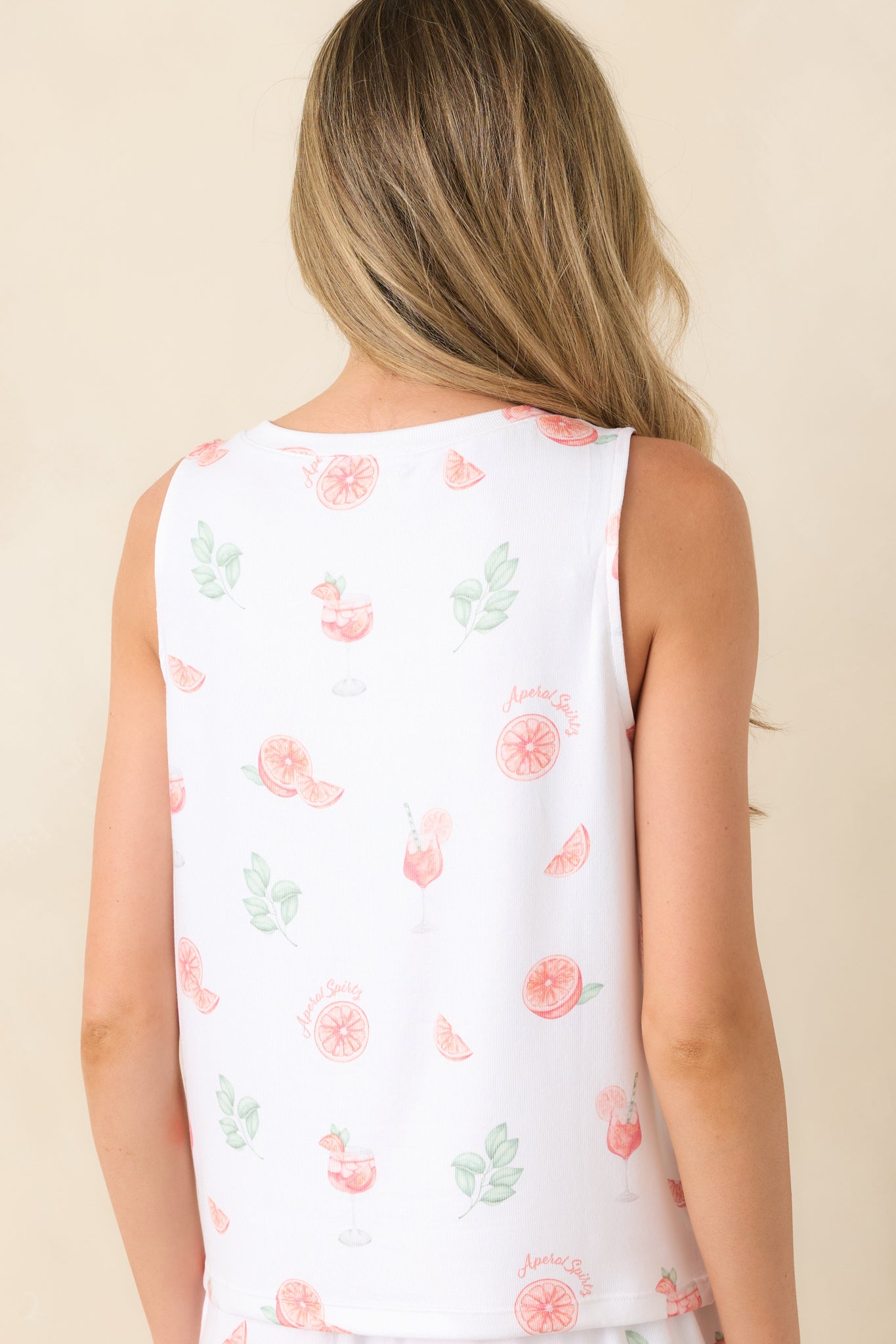 White sleeveless pajama tank top rear view with relaxed fit and allover citrus print.
