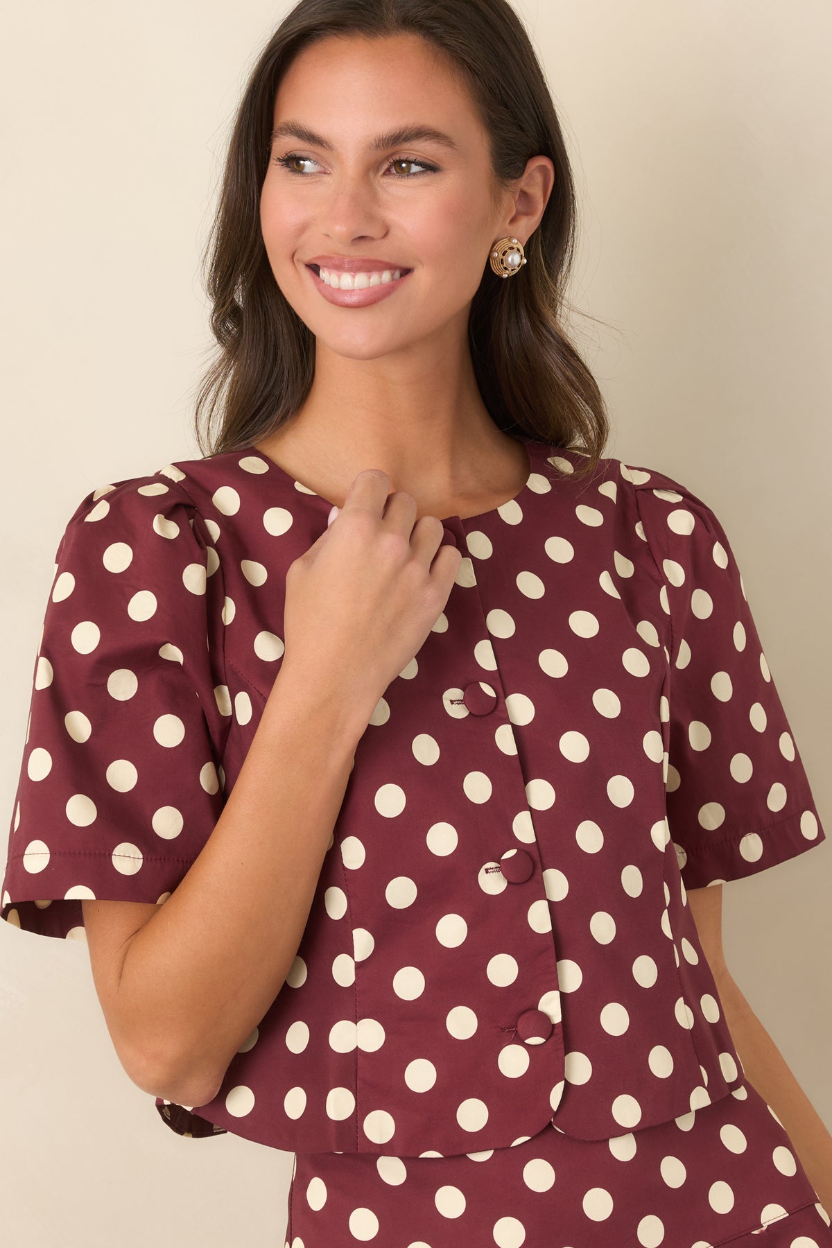 Rich wine cotton cropped top with gathered shoulders and softly structured short sleeves.