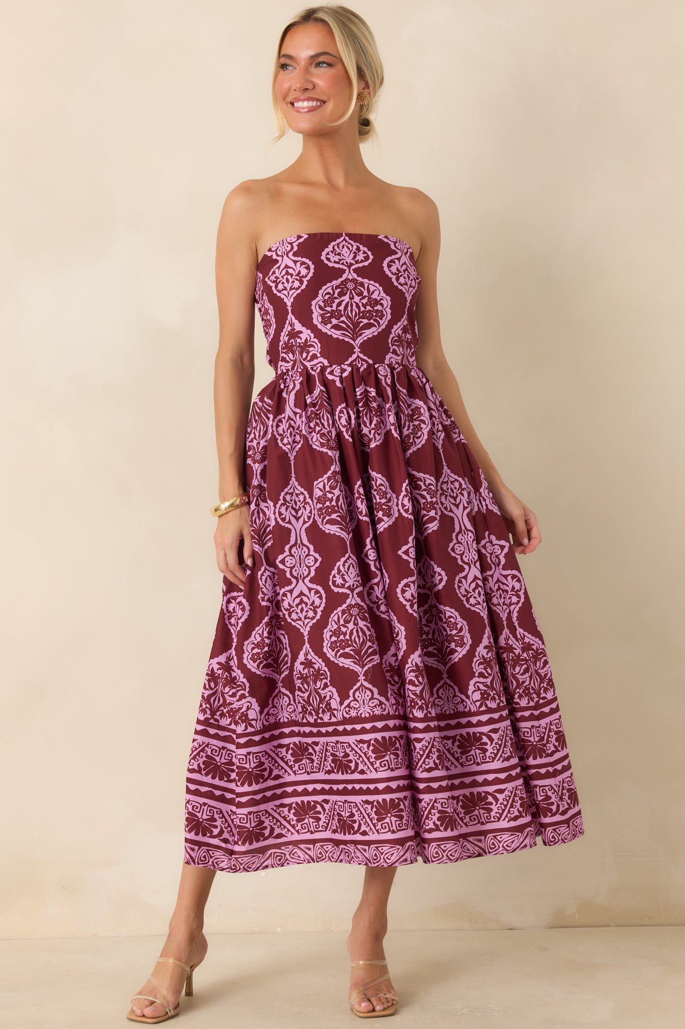 Wine and orchid pink cotton blend dress featuring a fitted bodice, gathered midi skirt, and elegant patterned finish.
