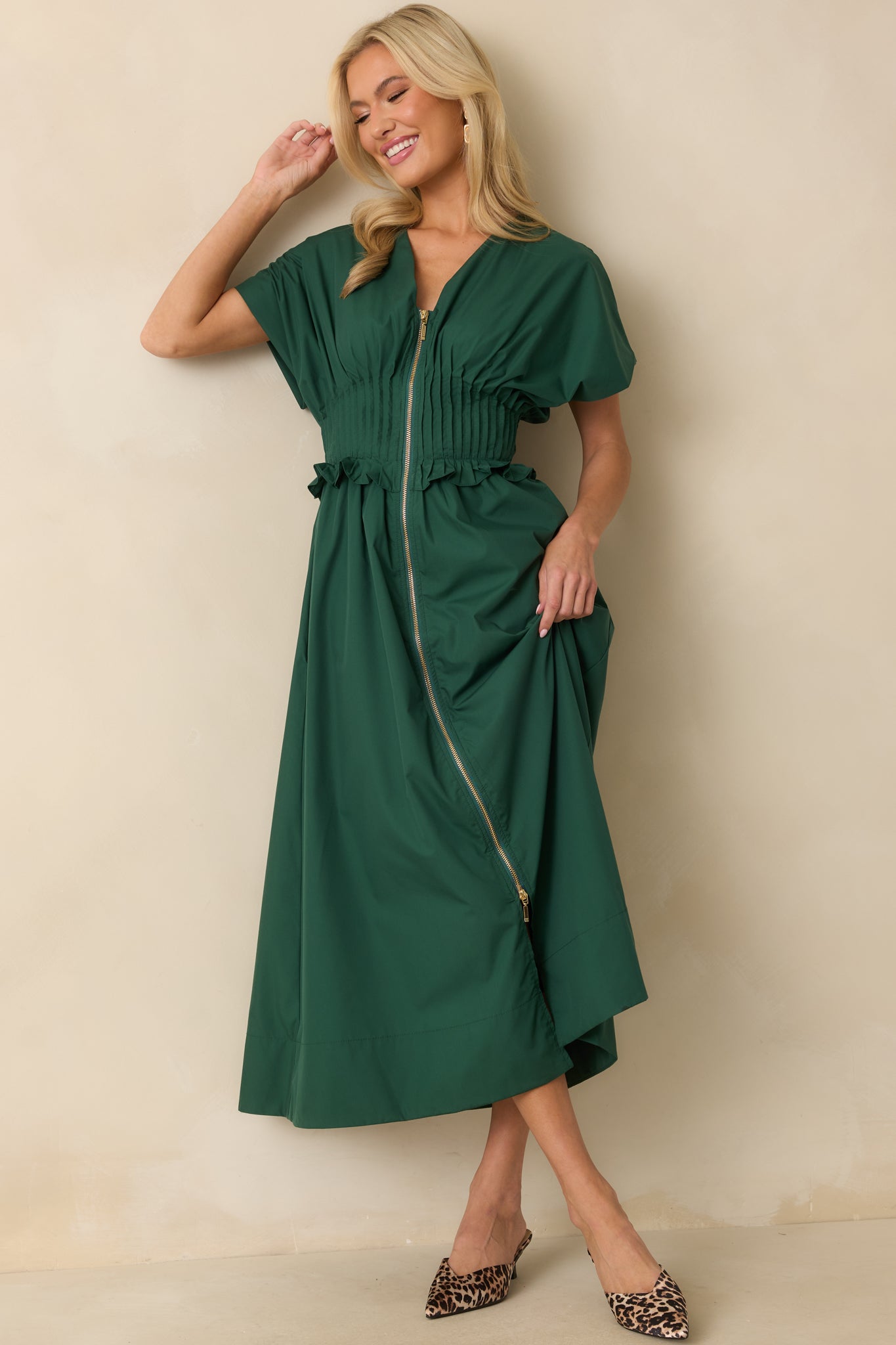 Woven maxi dress showcasing the ruffled trim at the waist and smooth A-line flow.