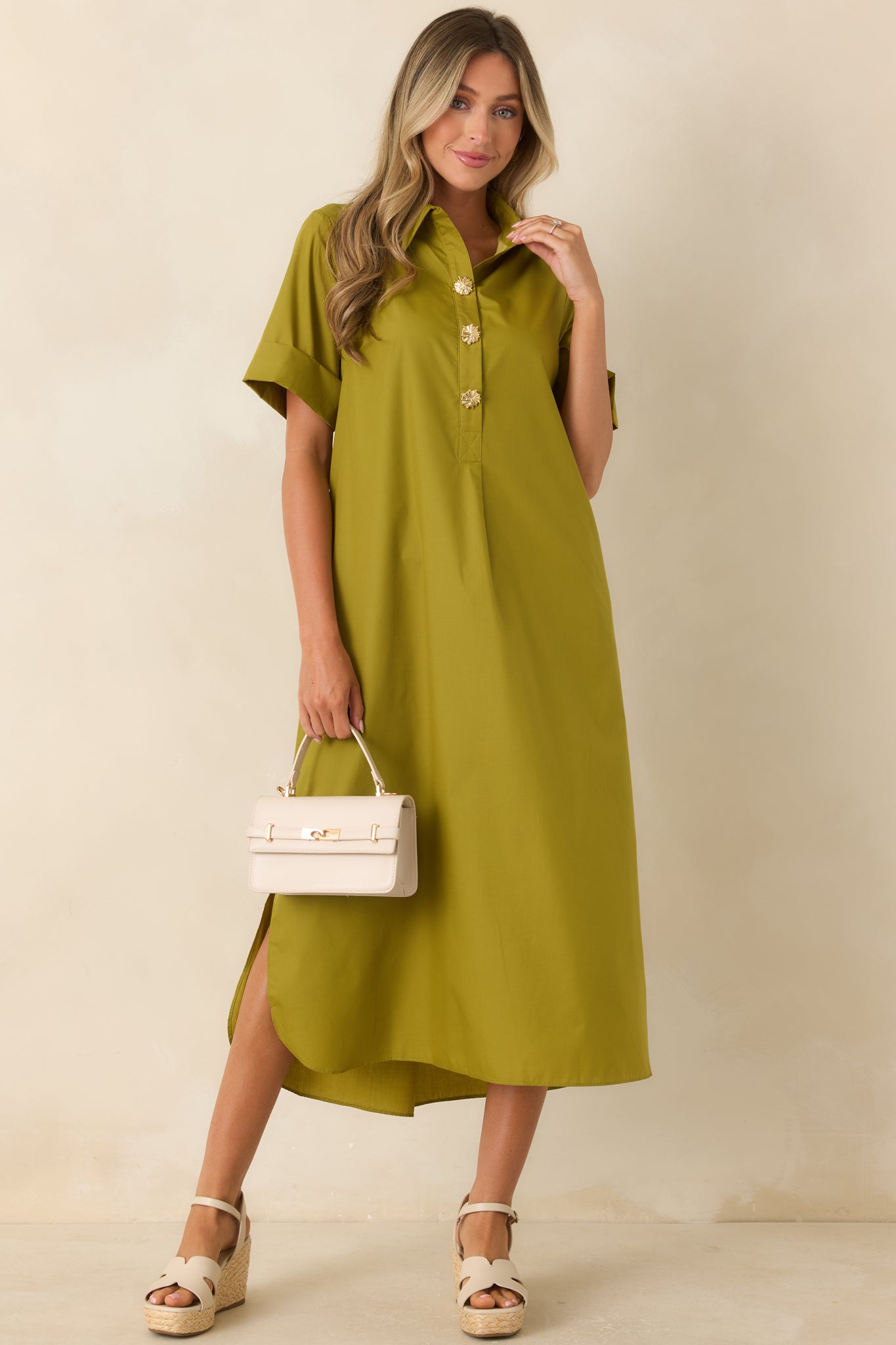 Woven maxi shirt dress showcasing a collared neckline, A-line shape, and soft movement through the relaxed design.