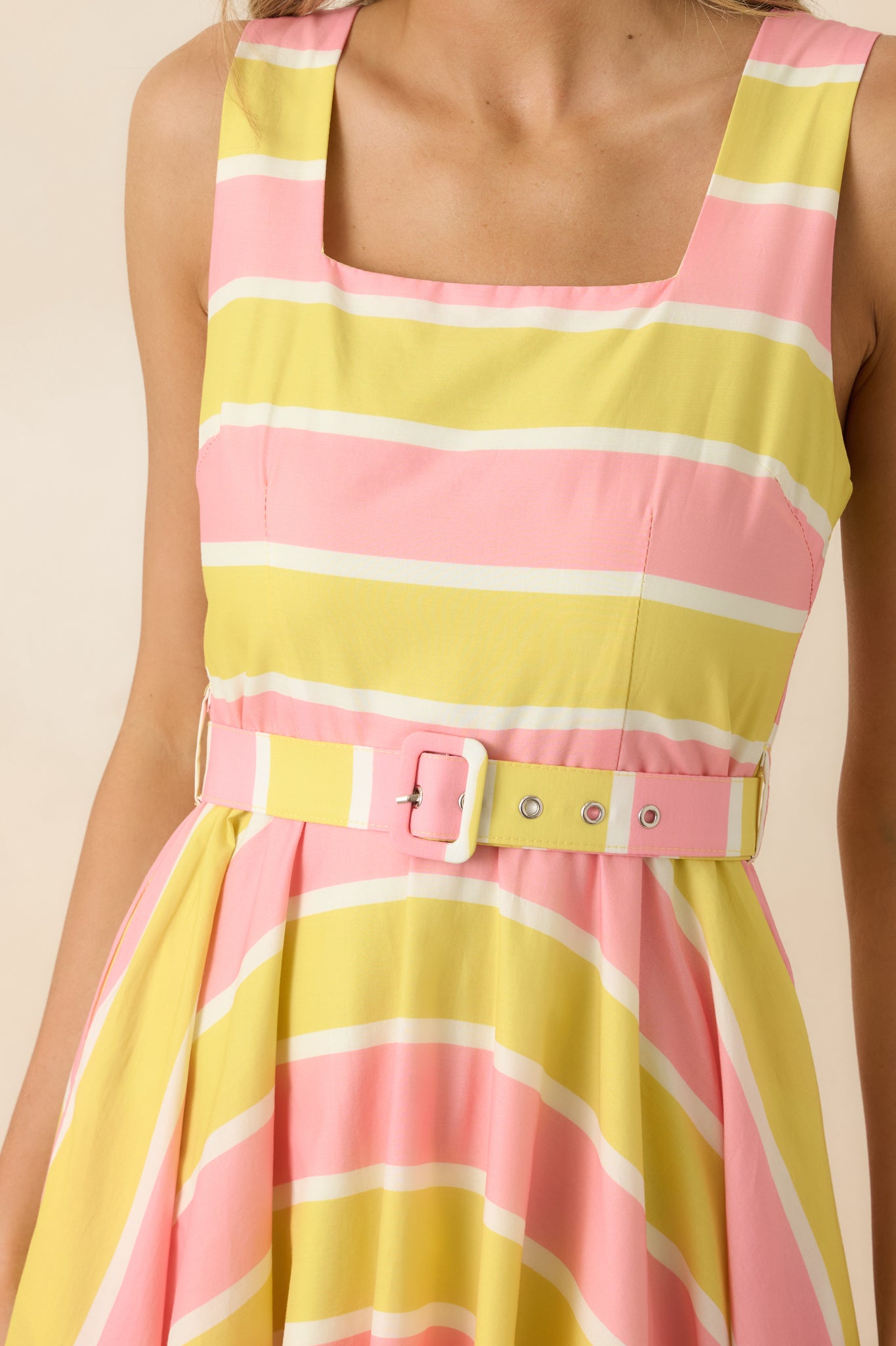 Yellow and coral stripe fabric with smocked back panel and textured cotton finish.