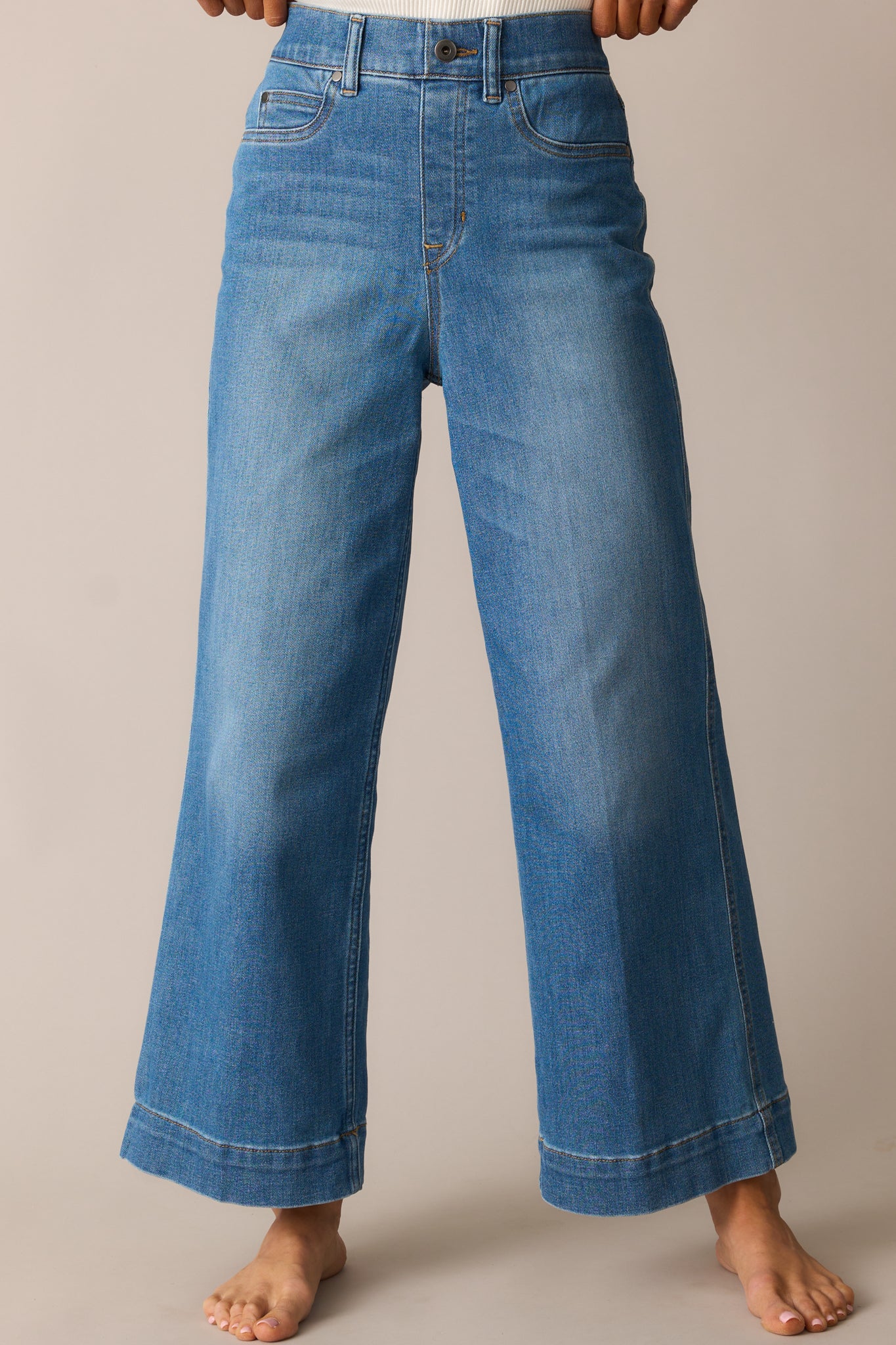 Zoomed-in hip and thigh area showing the contoured fit and smooth texture of the 4-way stretch fabric.