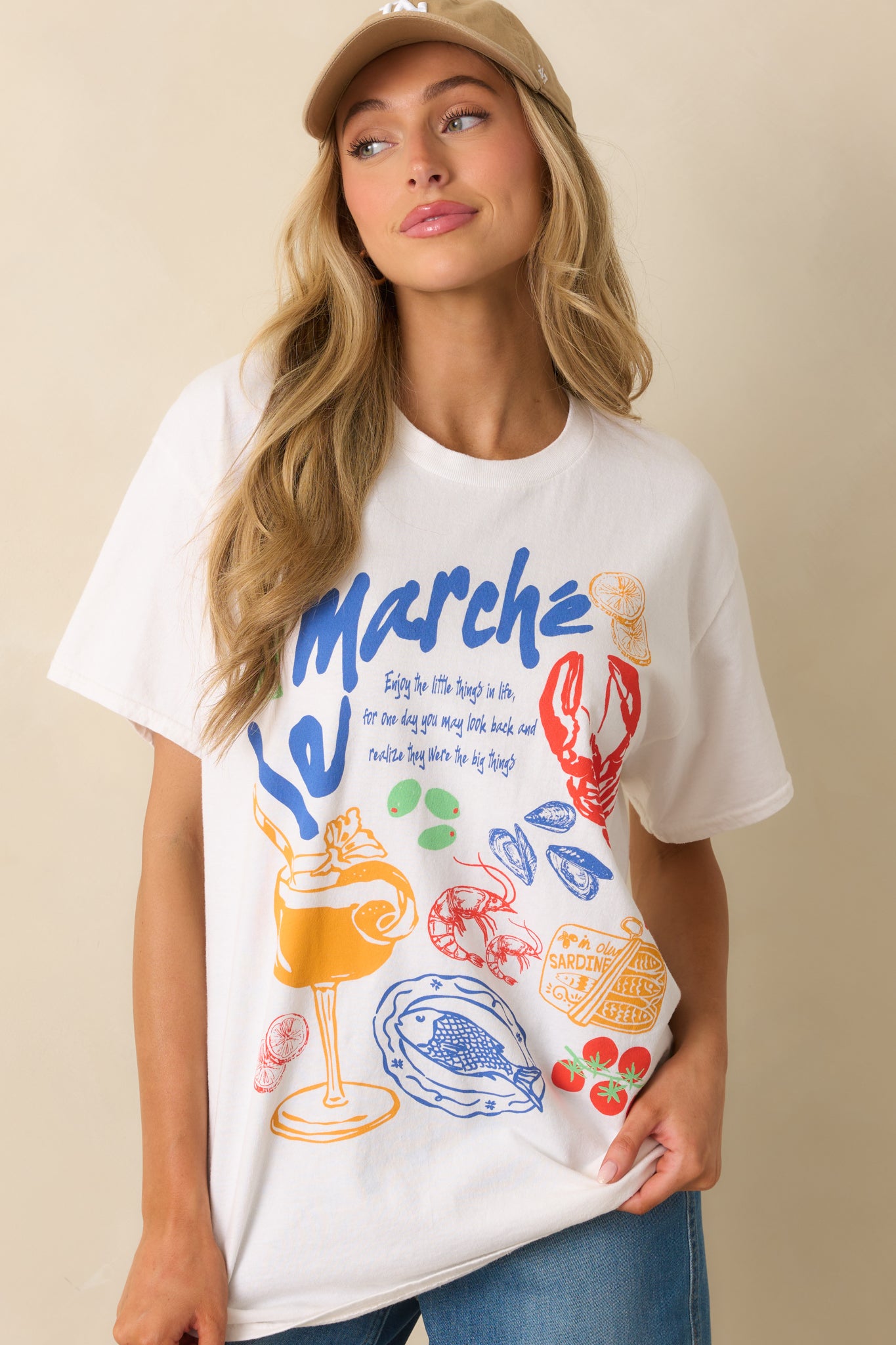 Zoomed in looked at the tee's lightweight cotton fabric and oversized fit with graphic details.