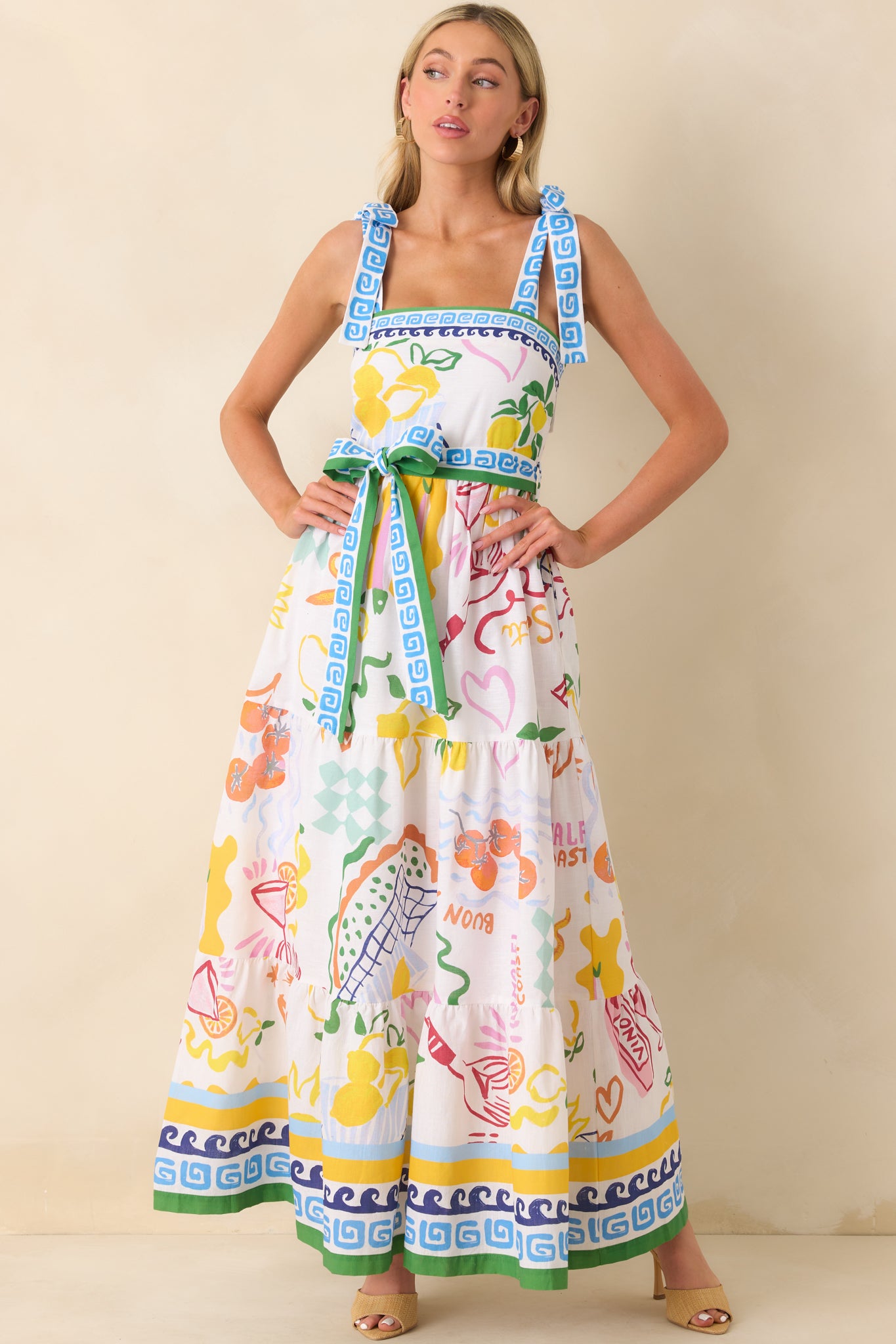 Front-facing shot highlighting the flowy maxi silhouette, self-tie belt at the waist, and subtle placement of functional pockets.