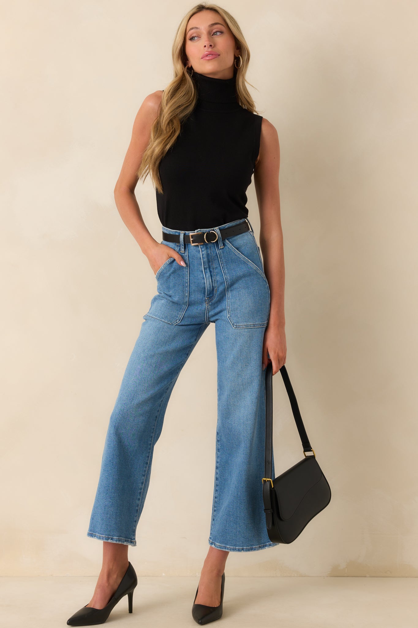 Front full body image showing the overall slim fit, rolled neckline, and small ribbed texture throughout.