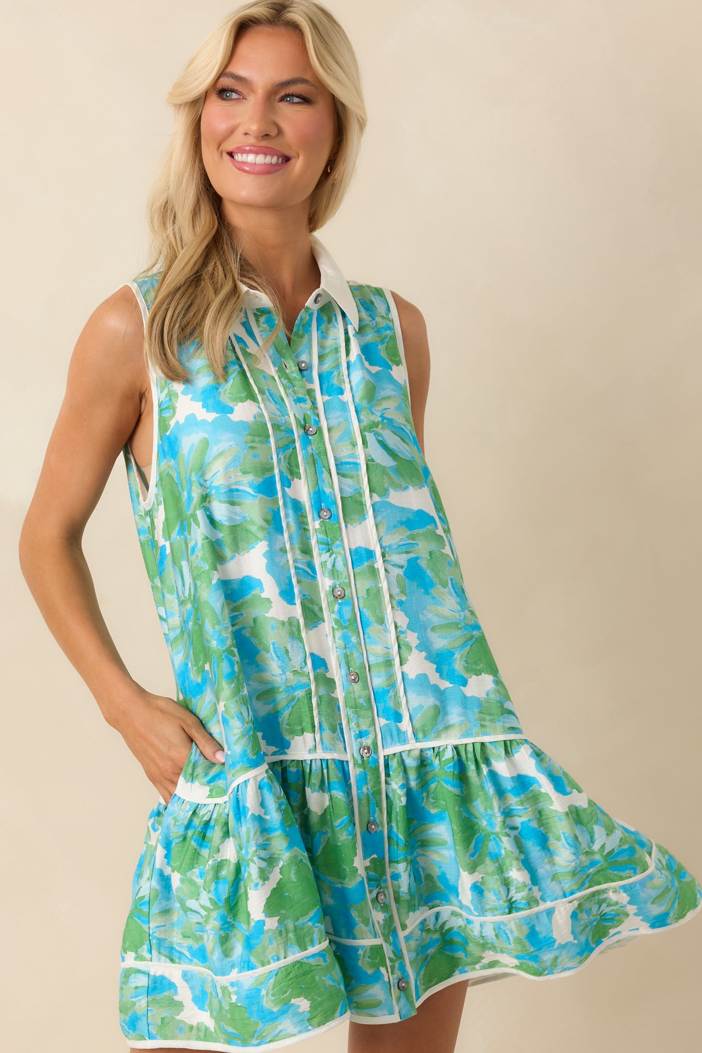 Cropped image emphasizing the pocket detail and how the white trim outlines the vibrant floral fabric.