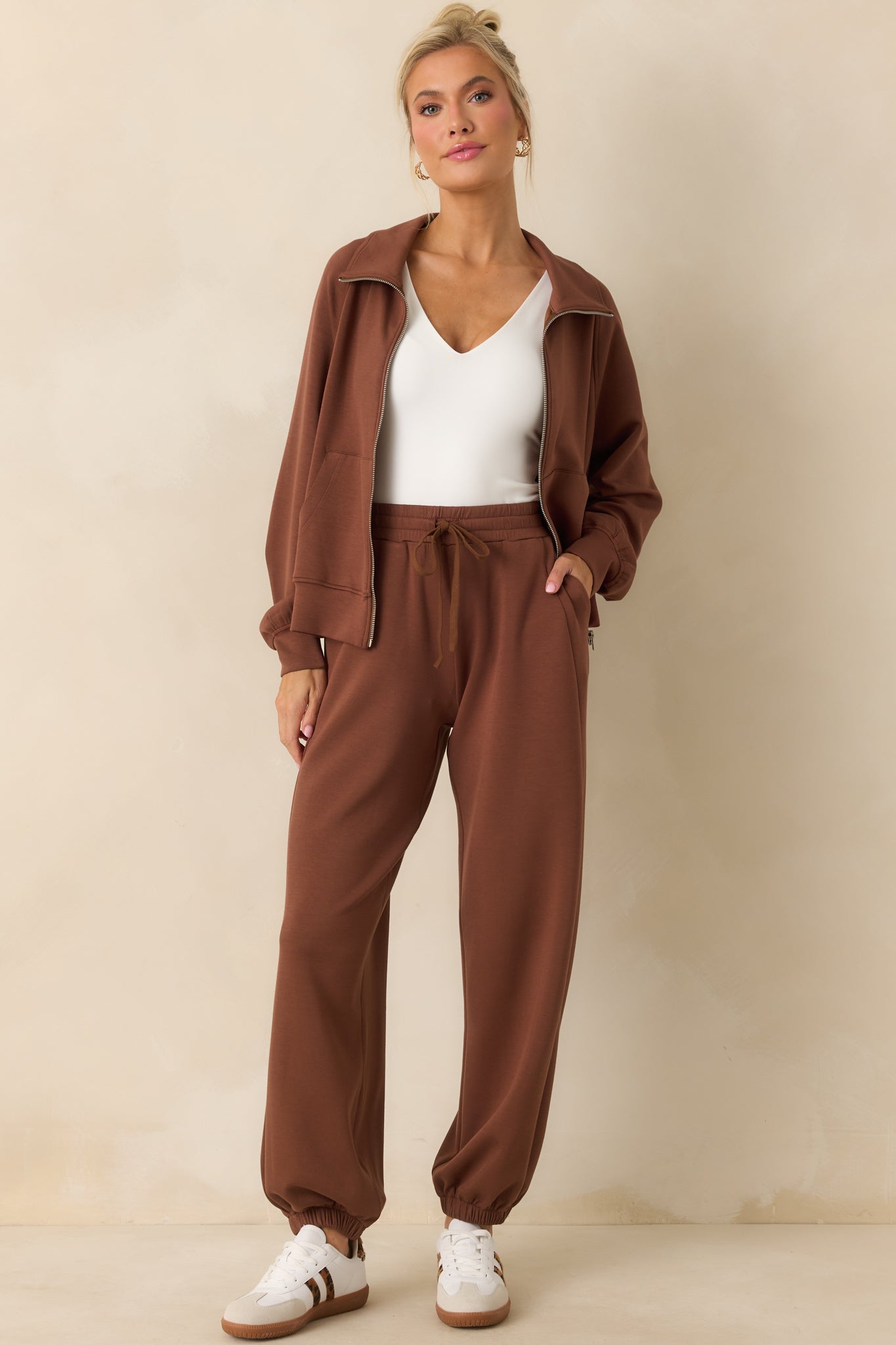 Full body view emphasizing the functional hip pockets and tapered silhouette.
