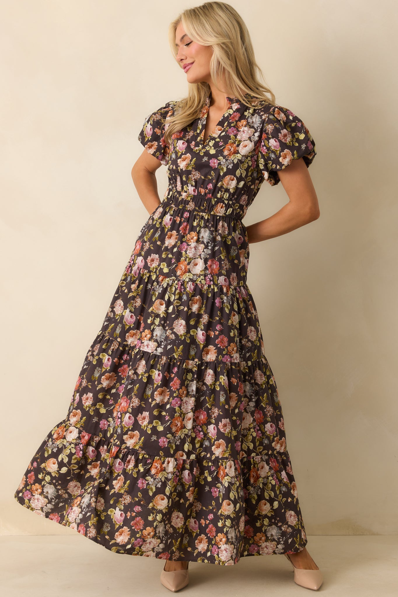 Whimsical brown dress scattered with florals in a relaxed maxi length.