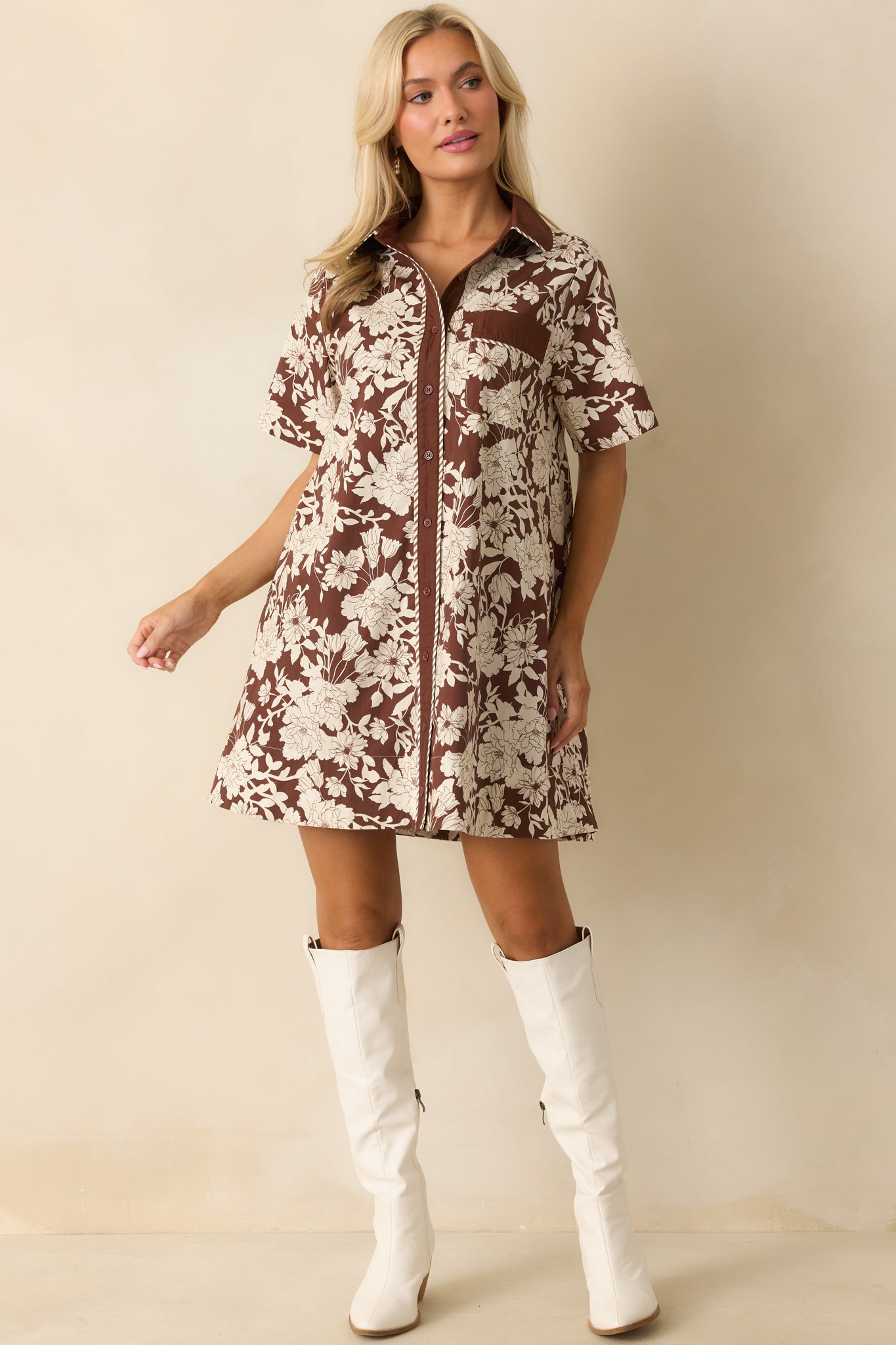 Front-facing shot highlighting the functional button front and short sleeves