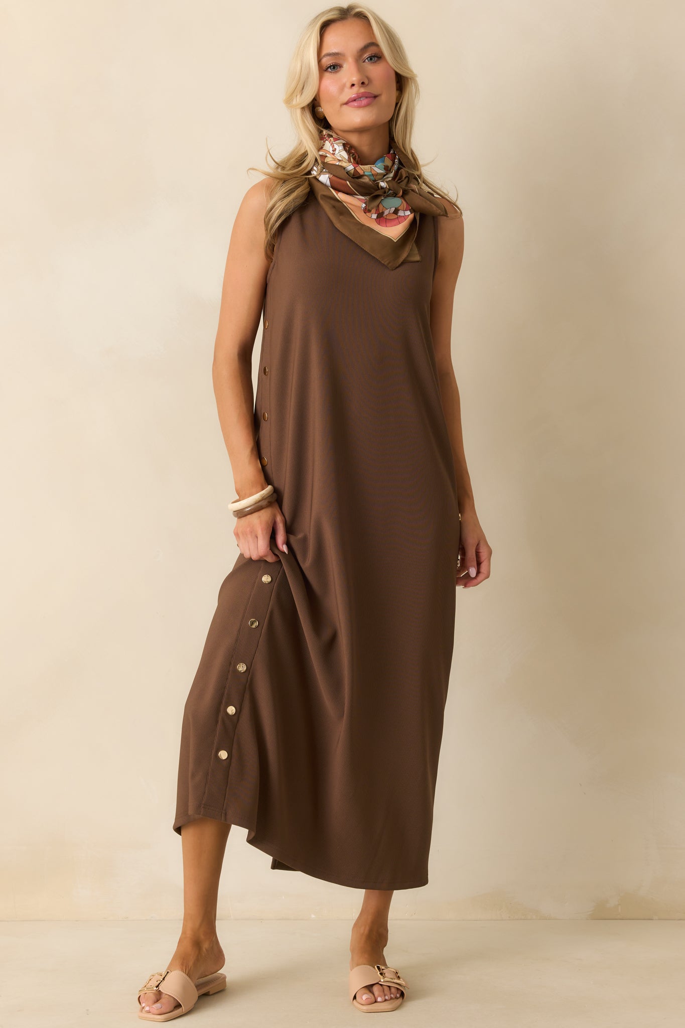 Full view of the brown maxi dress with crew neckline and relaxed fit.