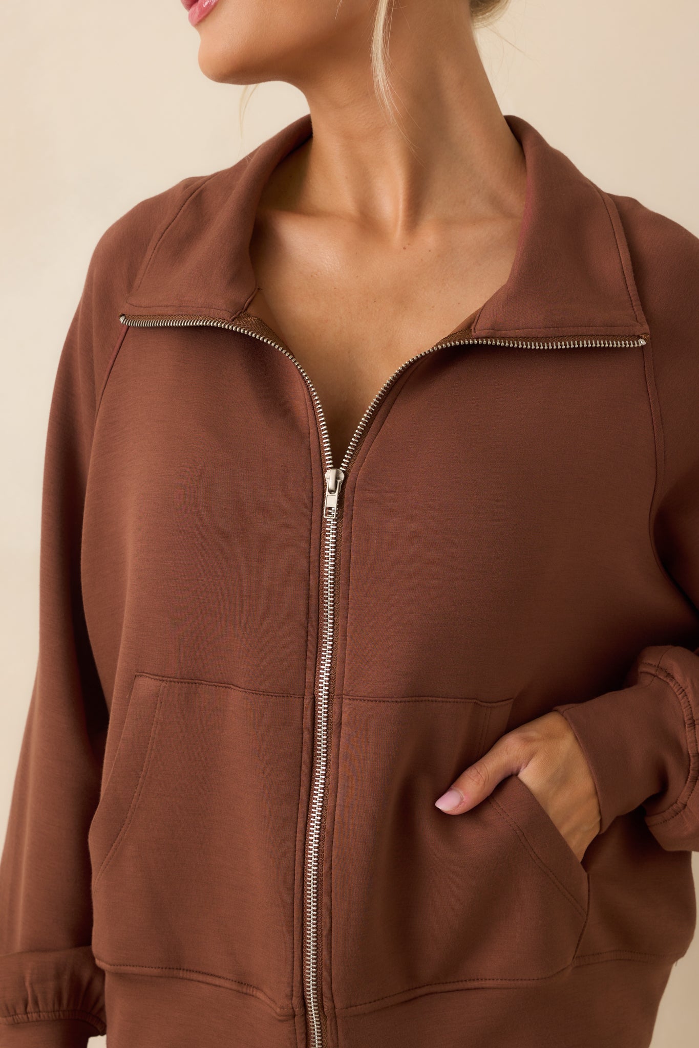 Cropped angle highlighting the side pocket and hem detail.