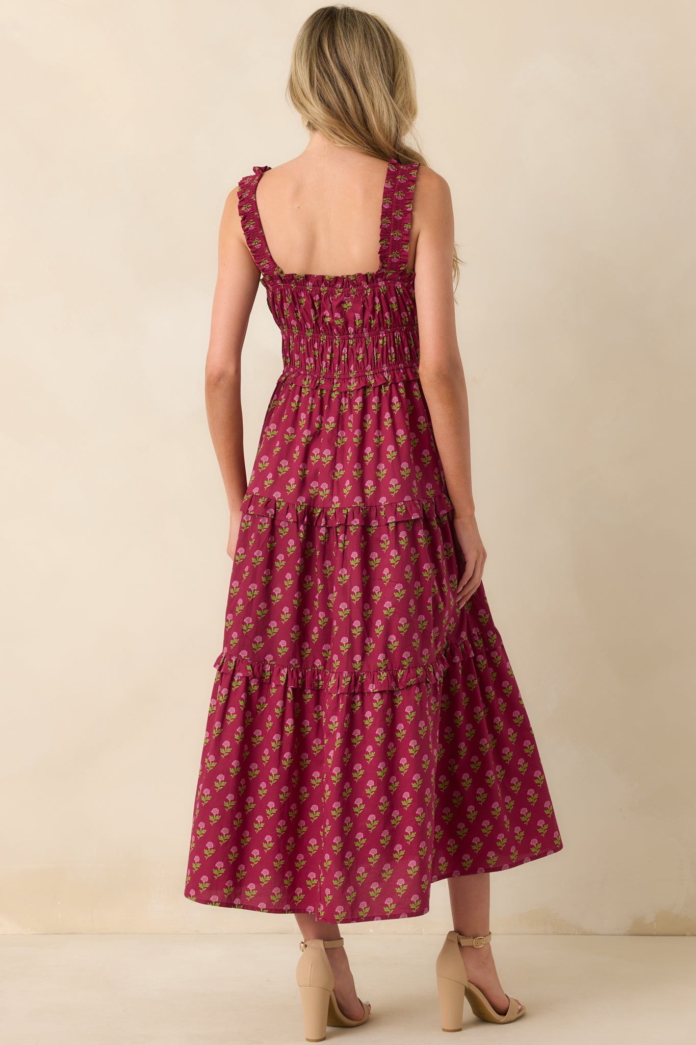 Back view displaying the elastic back inserts and the continuation of the floral pattern.
