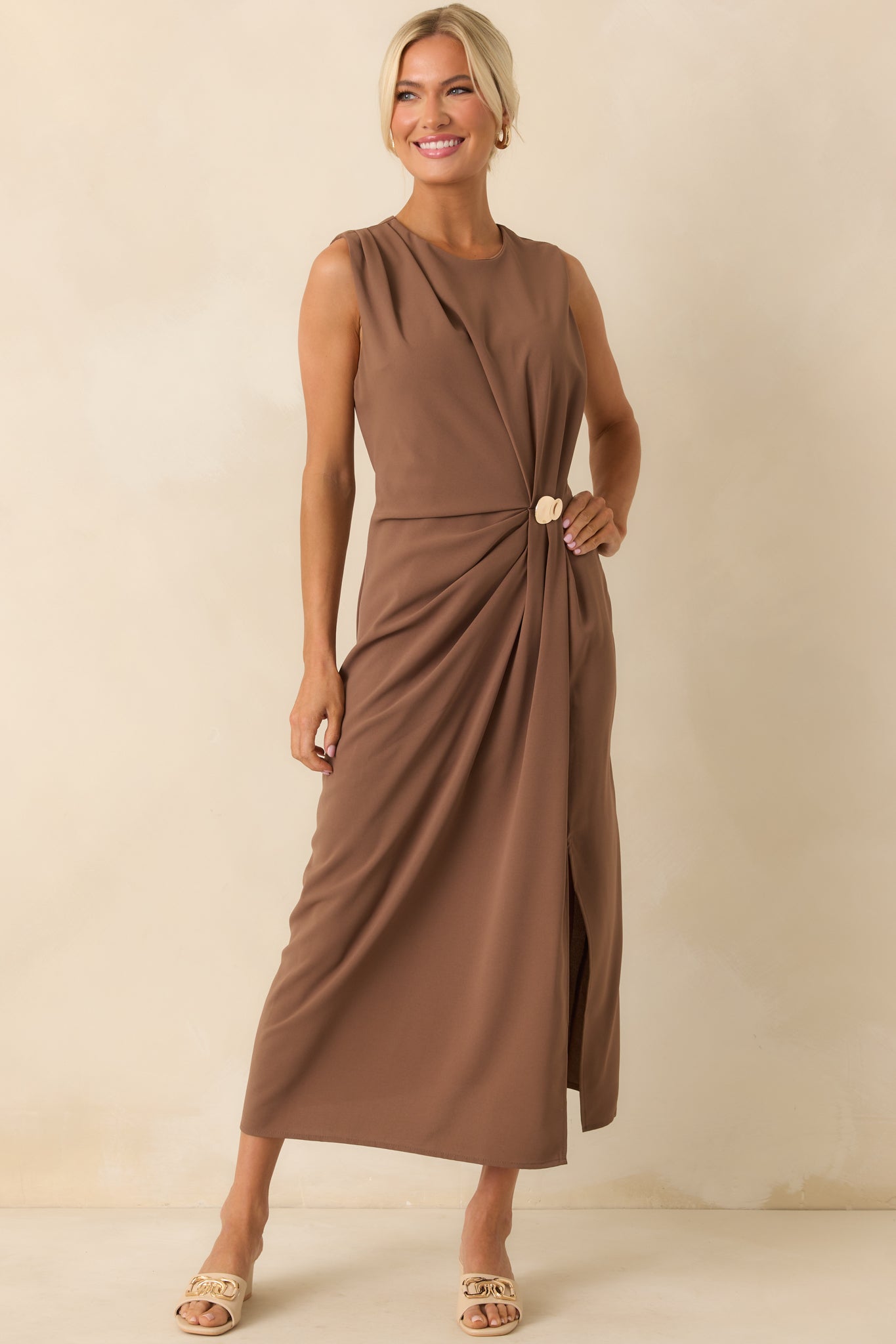 Straight-on pose showing the full length of the dress and the smooth fit through the body with gathered texture.