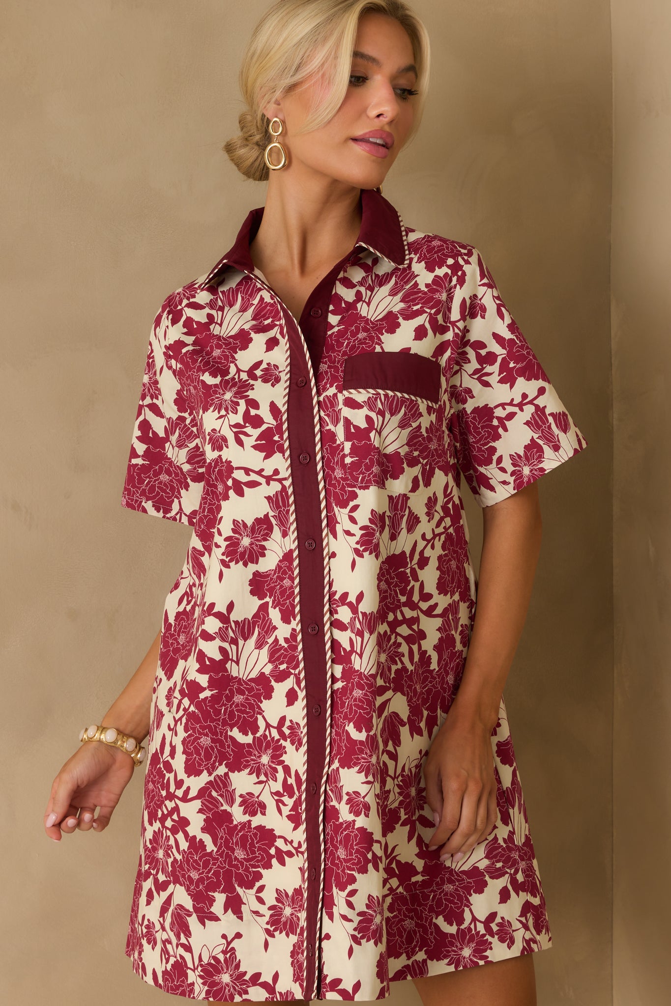 Functional side seam pocket hidden within the floral patterned fabric.