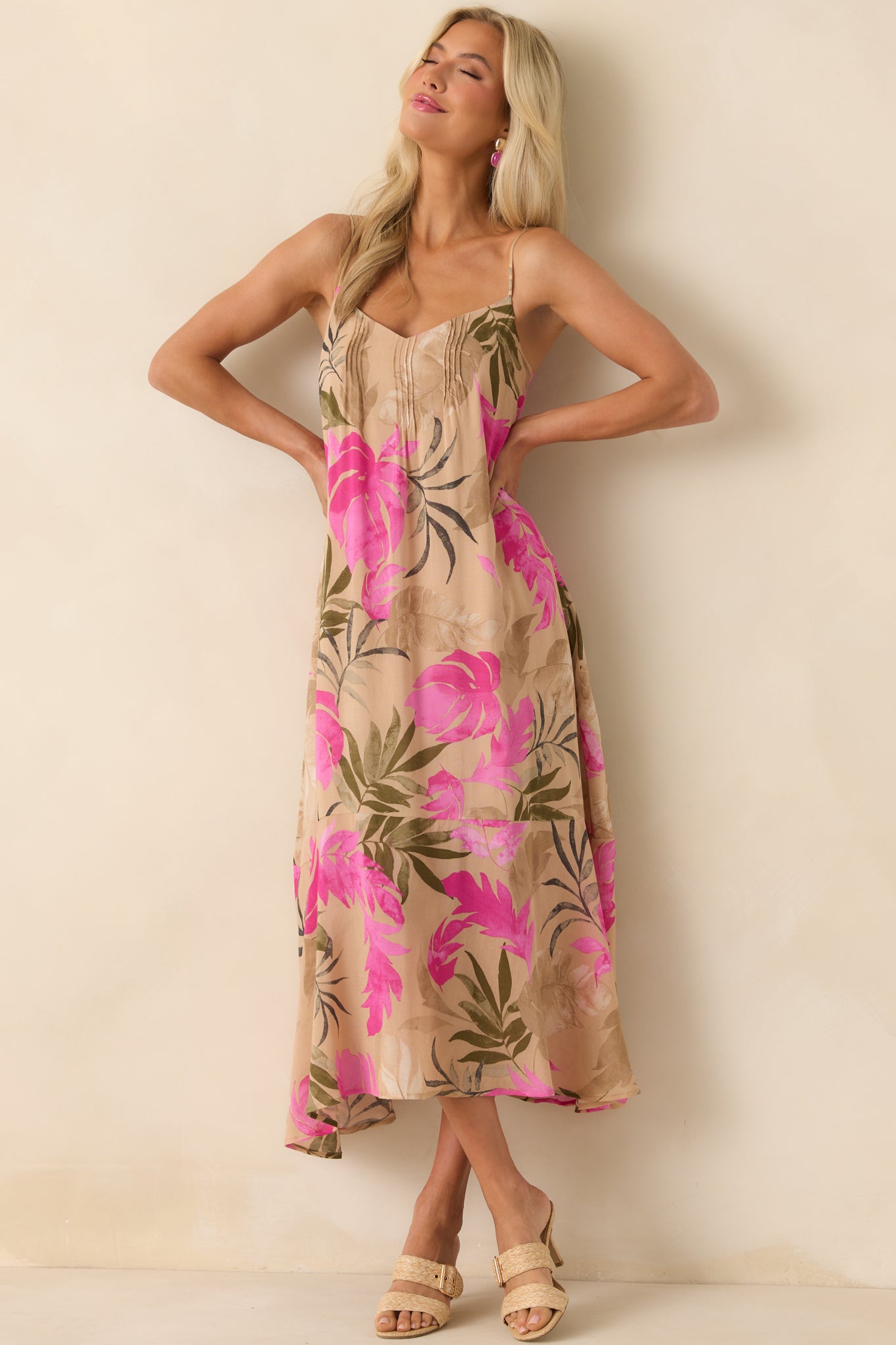 Full body image capturing the maxi length and the soft tan lining beneath the printed fabric.