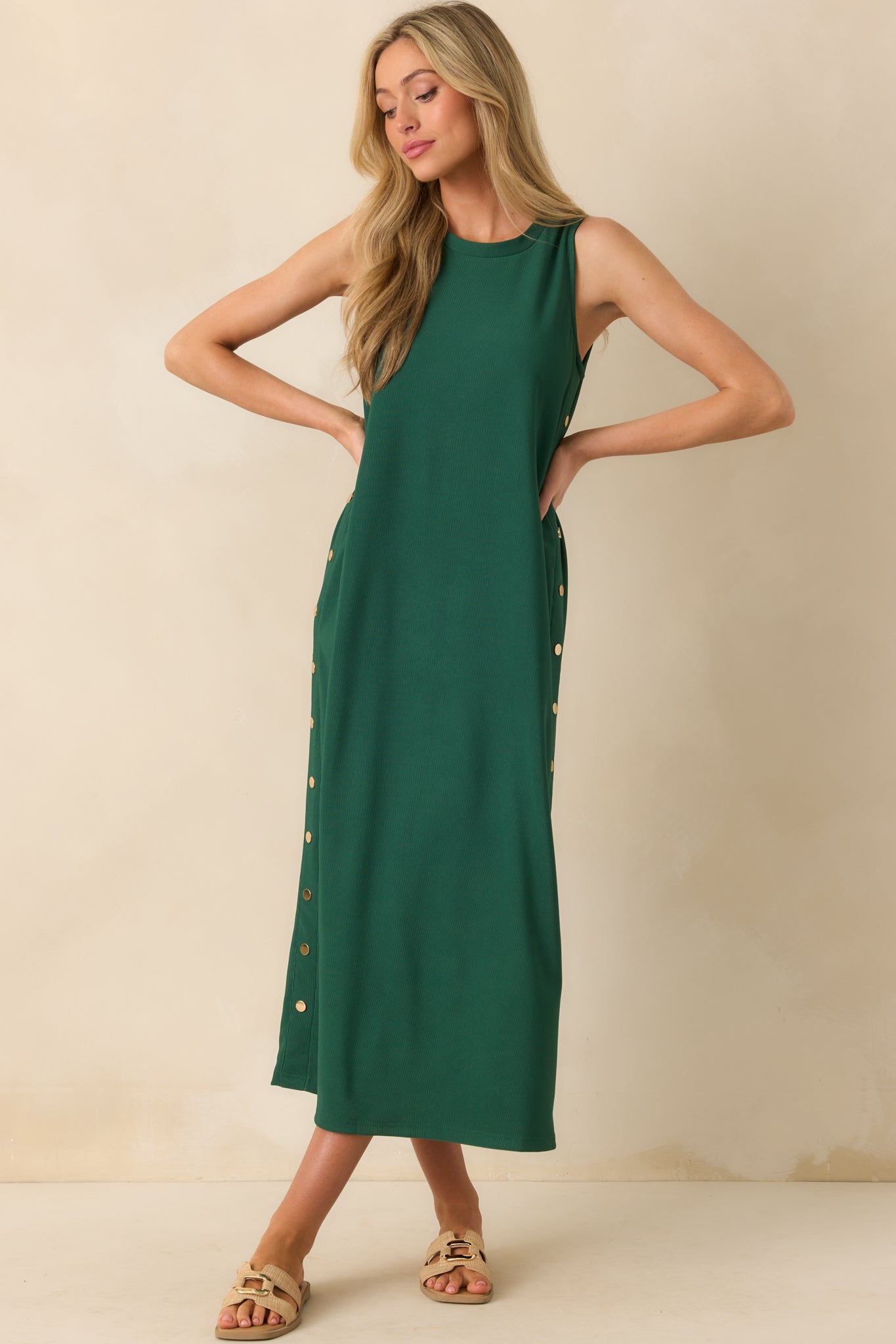Full body shot emphasizing the smooth silhouette and flow of the maxi length dress.